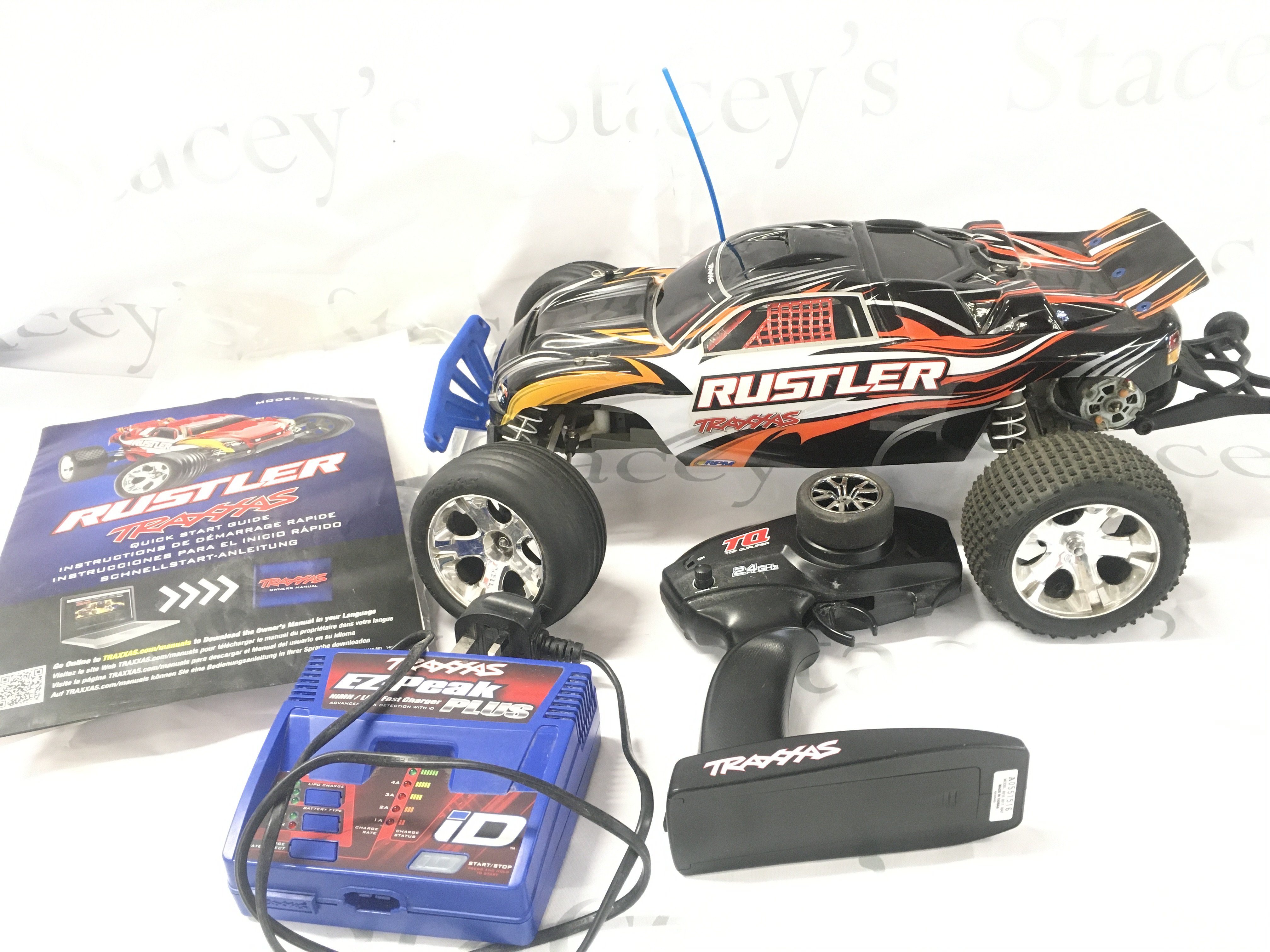 A Traxxas Rustler Remote Controlled Car With Charger. Instructions. And Remote. No Reserve.