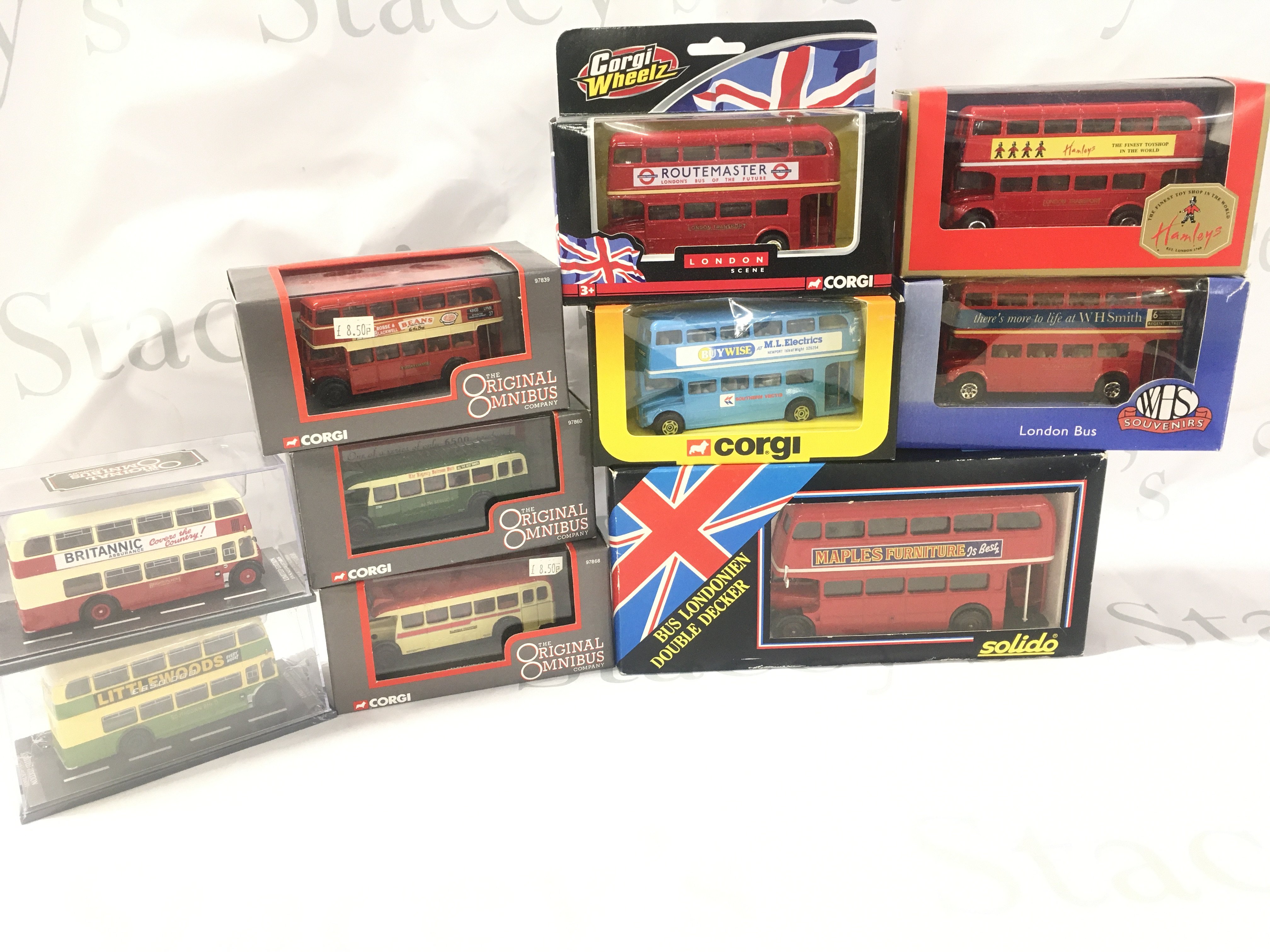 10 Boxed Diecast Buses Including Corgi. Solido Etc.