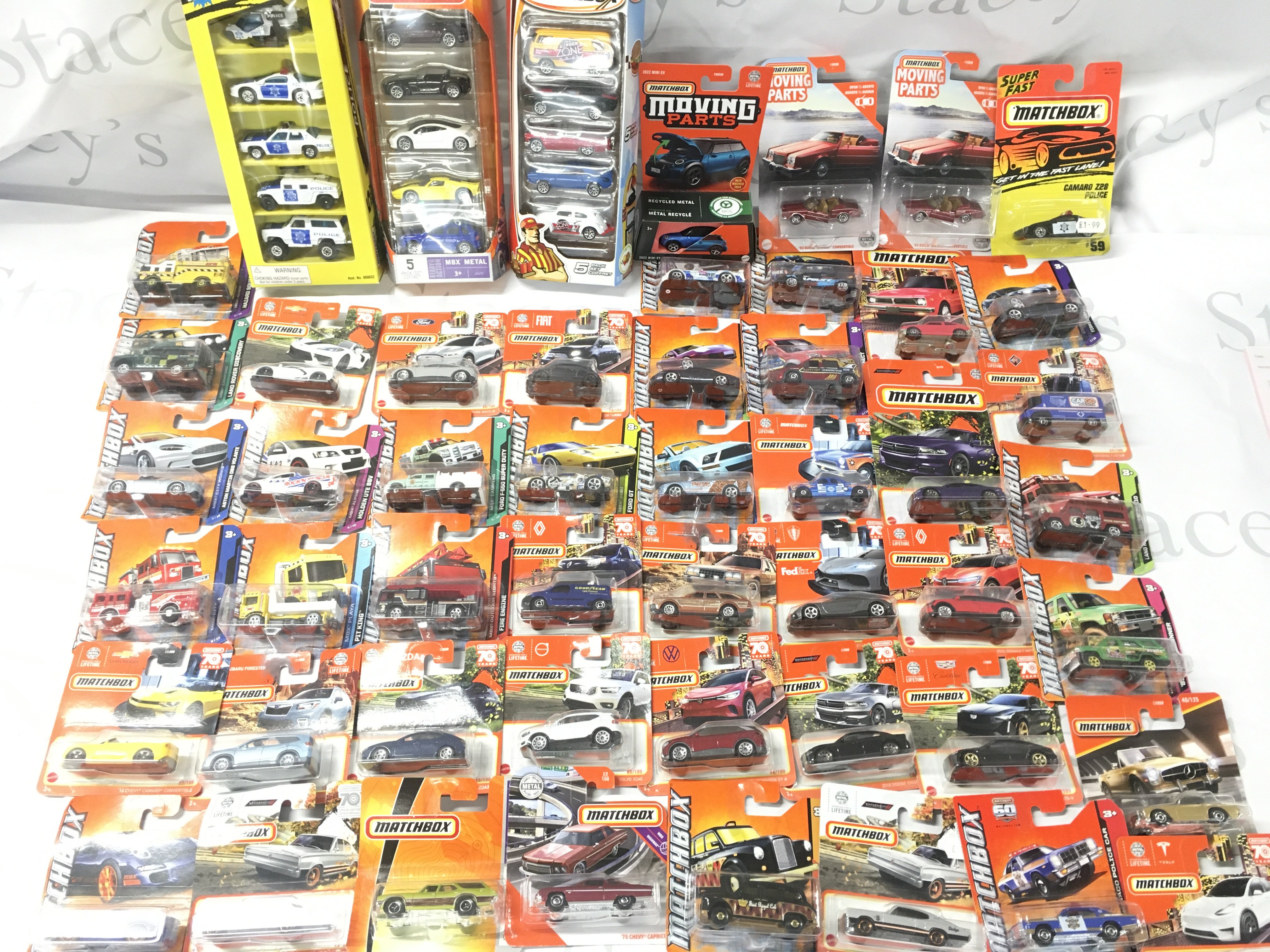 A Collection of Mostly modern Carded Matchbox Cars. No Reserve. (2).