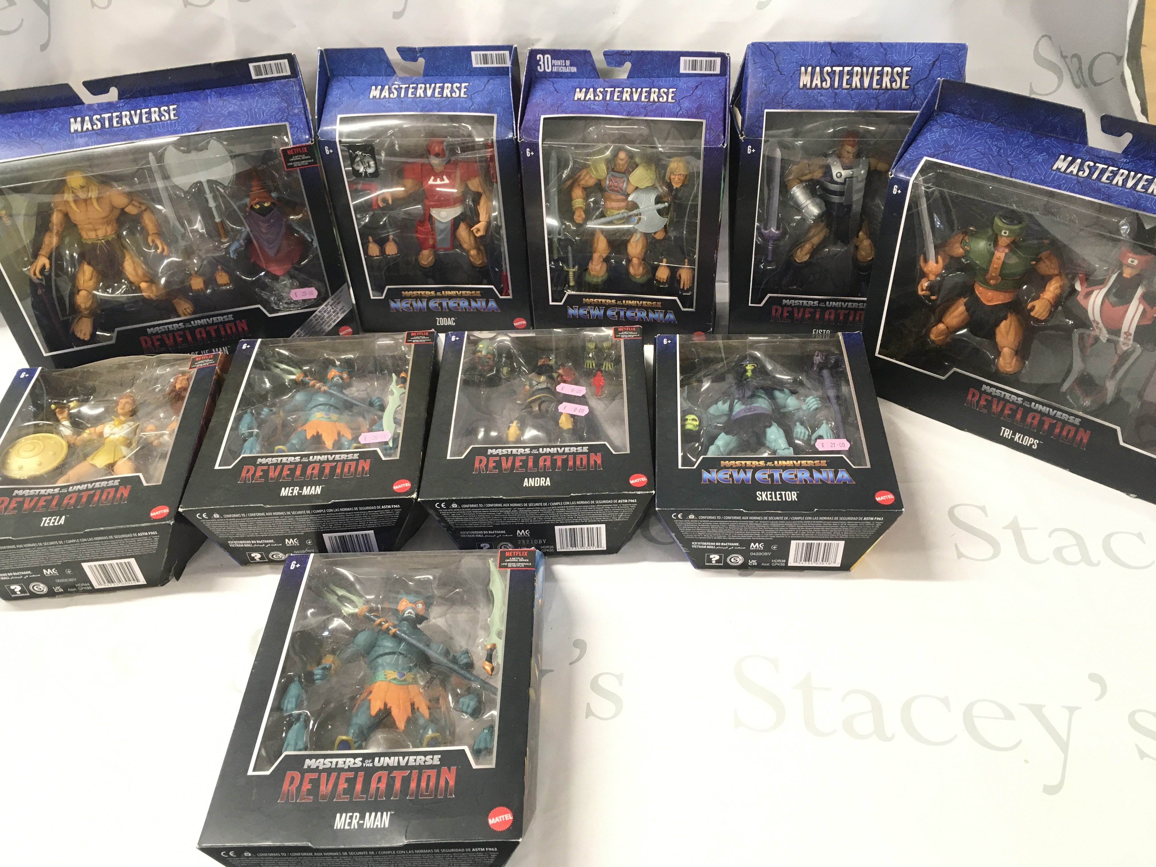 A Collection of Boxed Masters Of The Universe Figures from Revelation And New Eternia.