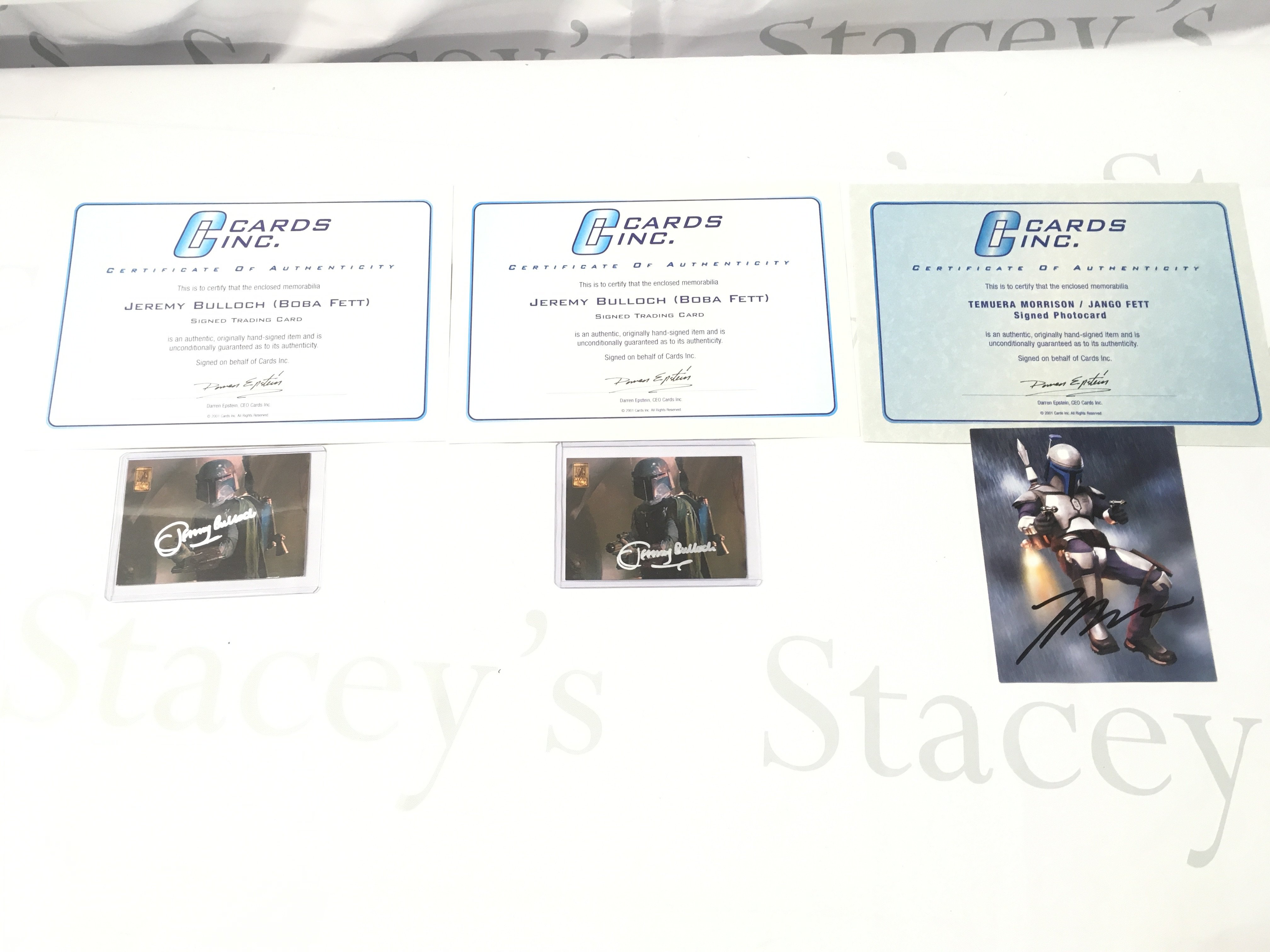 2X Signed Star Wars Jeremy Bulloch (Boba Fett) Merlin Trading Cards and a Temuera Morrison (Jango Fett) photo Card. With Certificates.