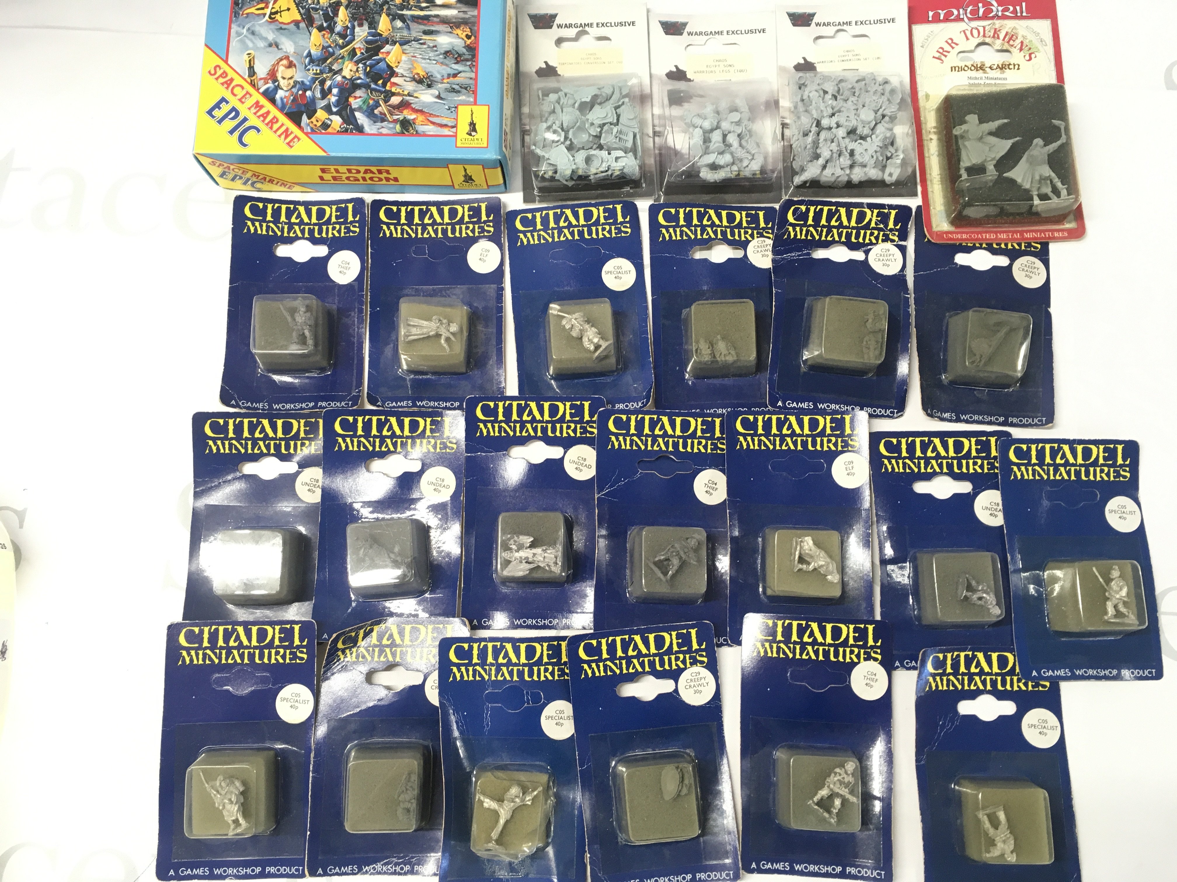 A Collection of War Hammer miniatures sealed In Blister Packs. Includes a Sealed Elder Legion Pack.