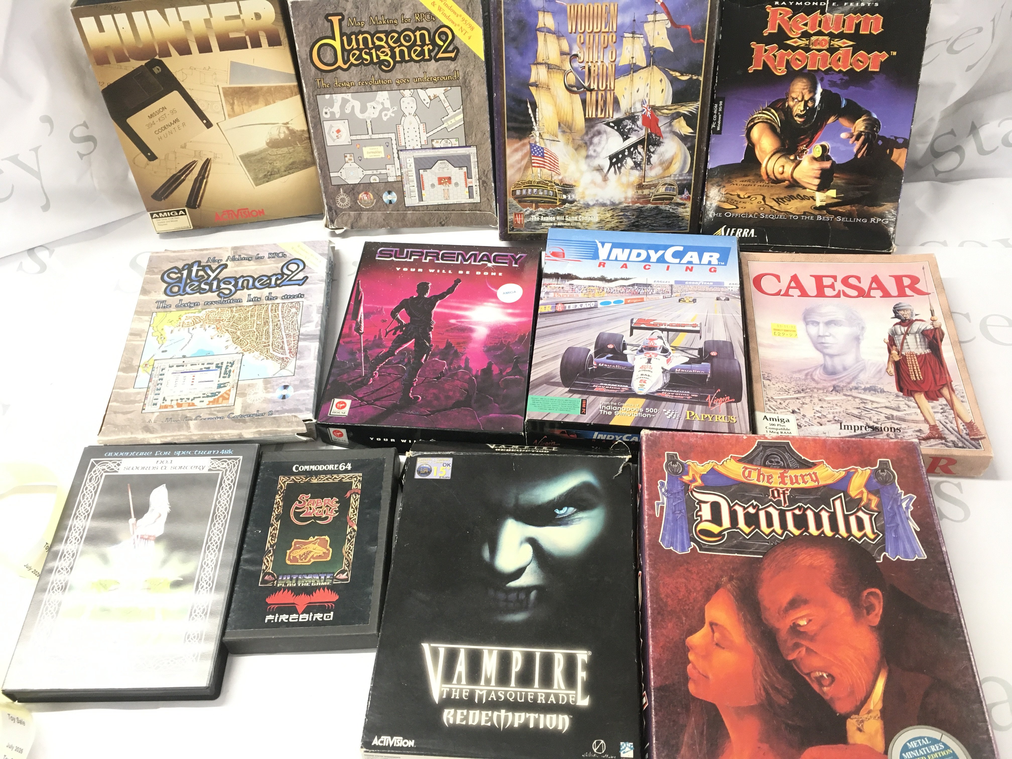 A Box Containing Various Computer Games and a Board Game. No Reserve.