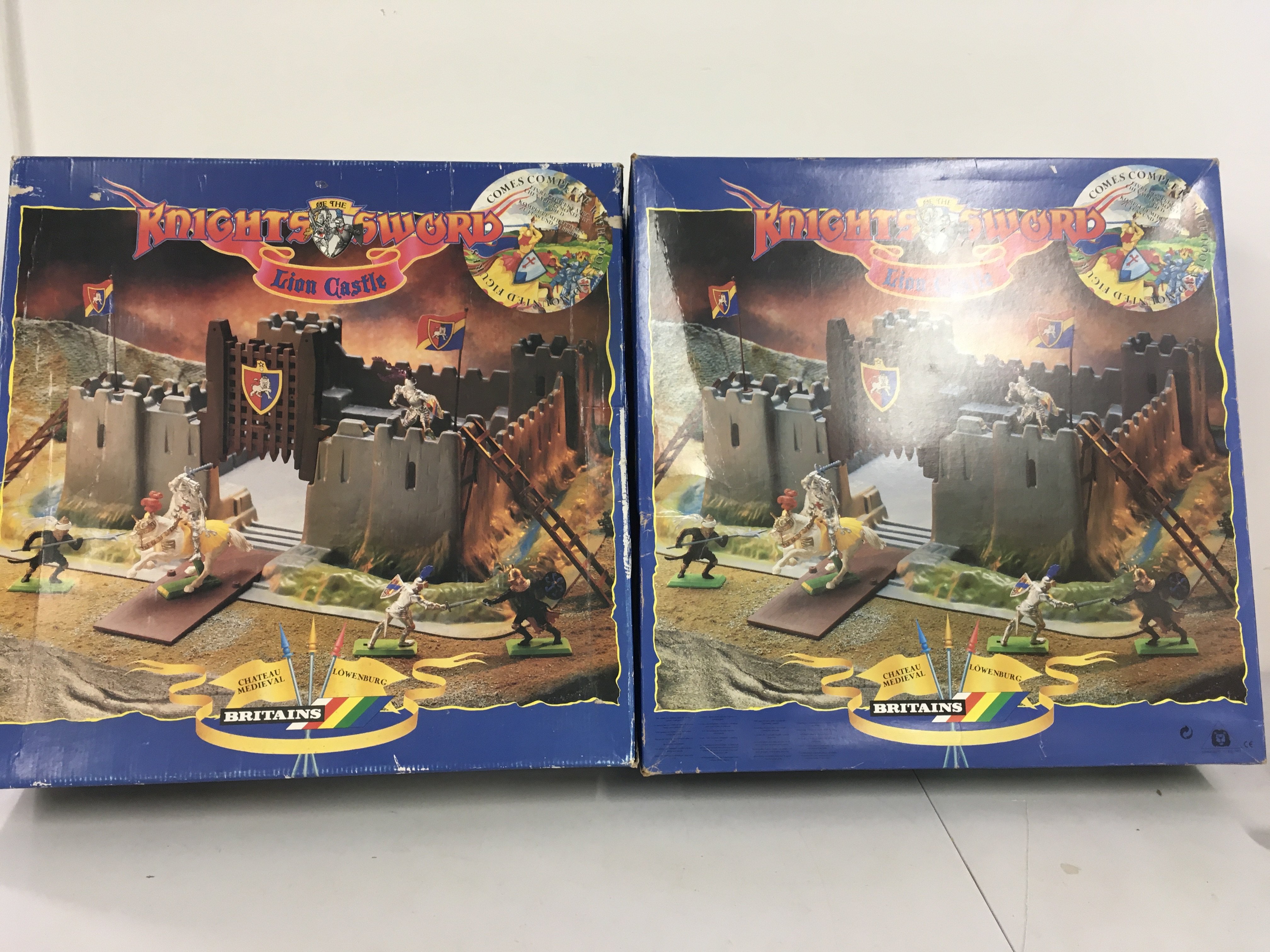 2x boxed sets Britains Knights of the Sword Lion Castle with extras and a quantity of Timpo and Britains knights. (2)