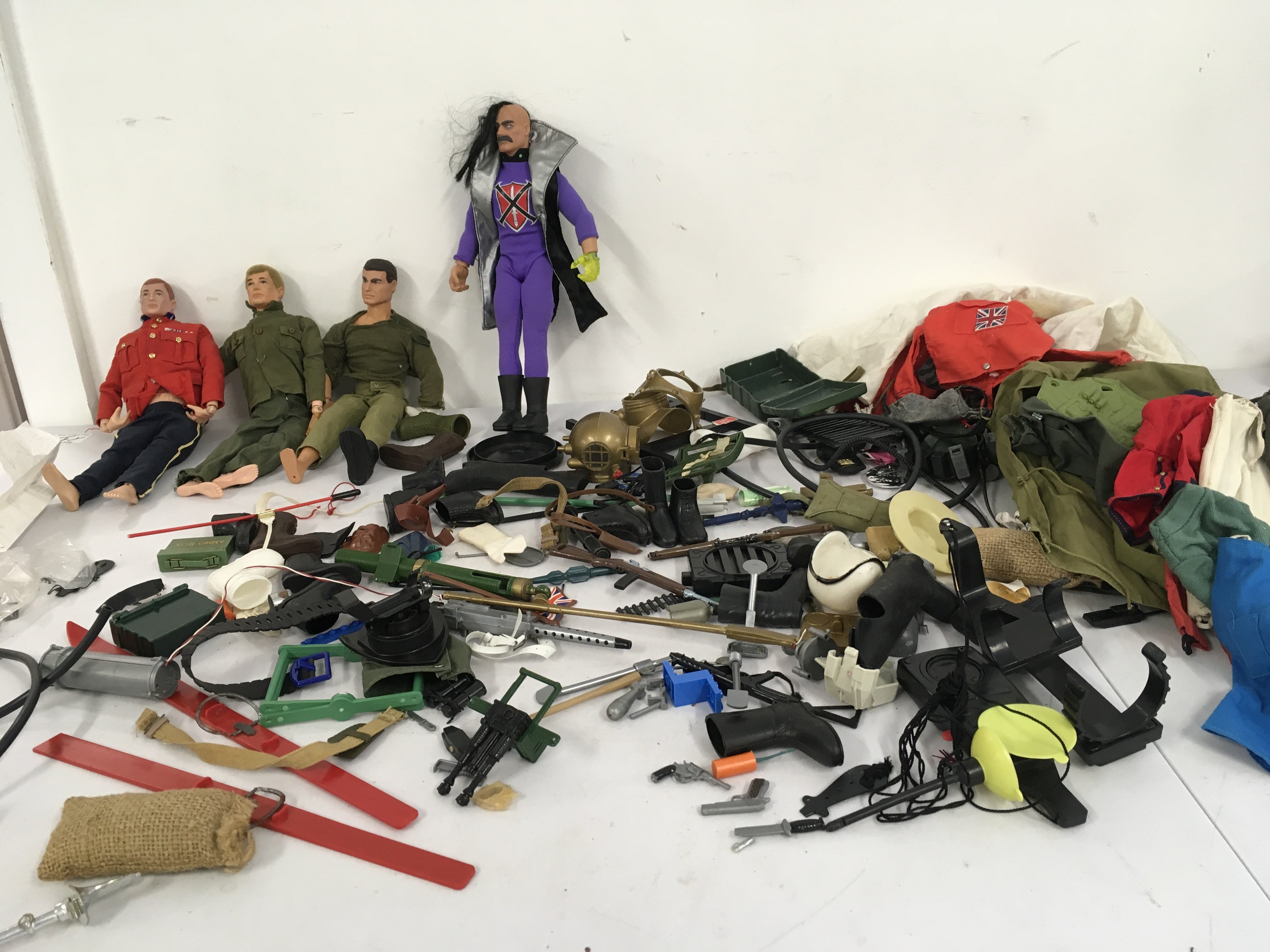 A collection of vintage and modern Action Man with a good selection of accessories. No reserve