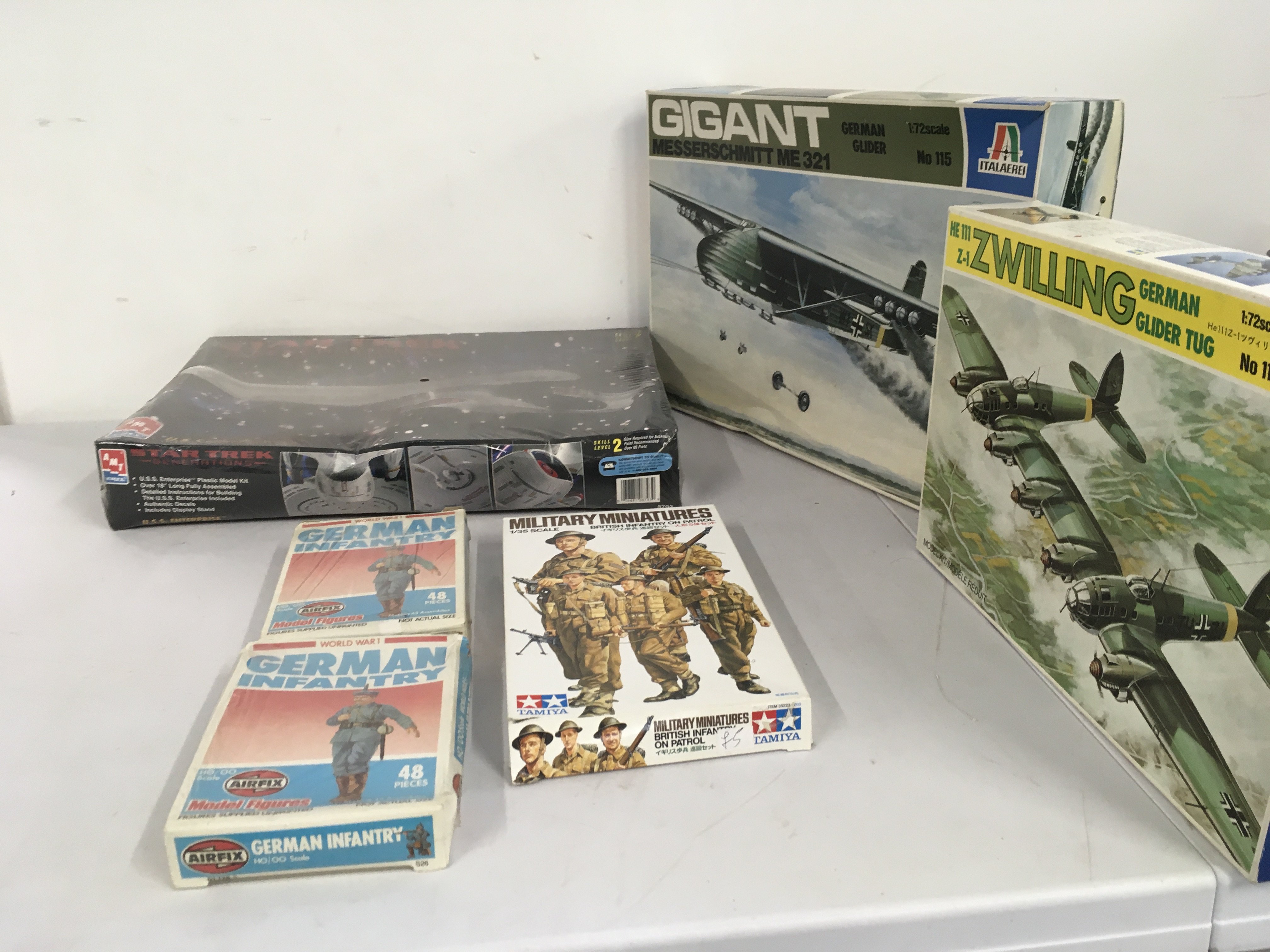 A collection of 6 models kits by Italeri..AMT..Airfix and Tamiya featuring military aircraft, soldiers and USS Enterprise. No reserve