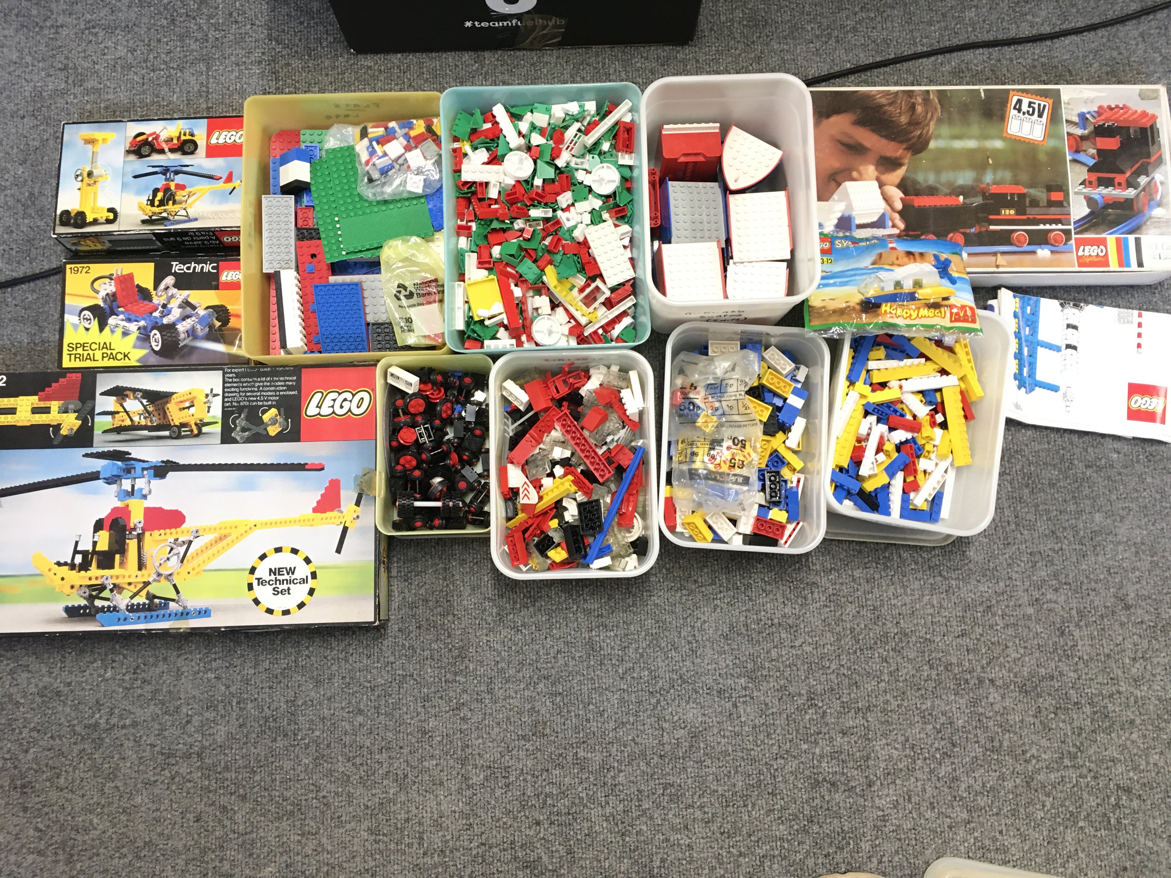 A collection of boxed and loose Lego including boxes containing wheels..squares..specials etc. also includes box of Beta builder. No reserve.