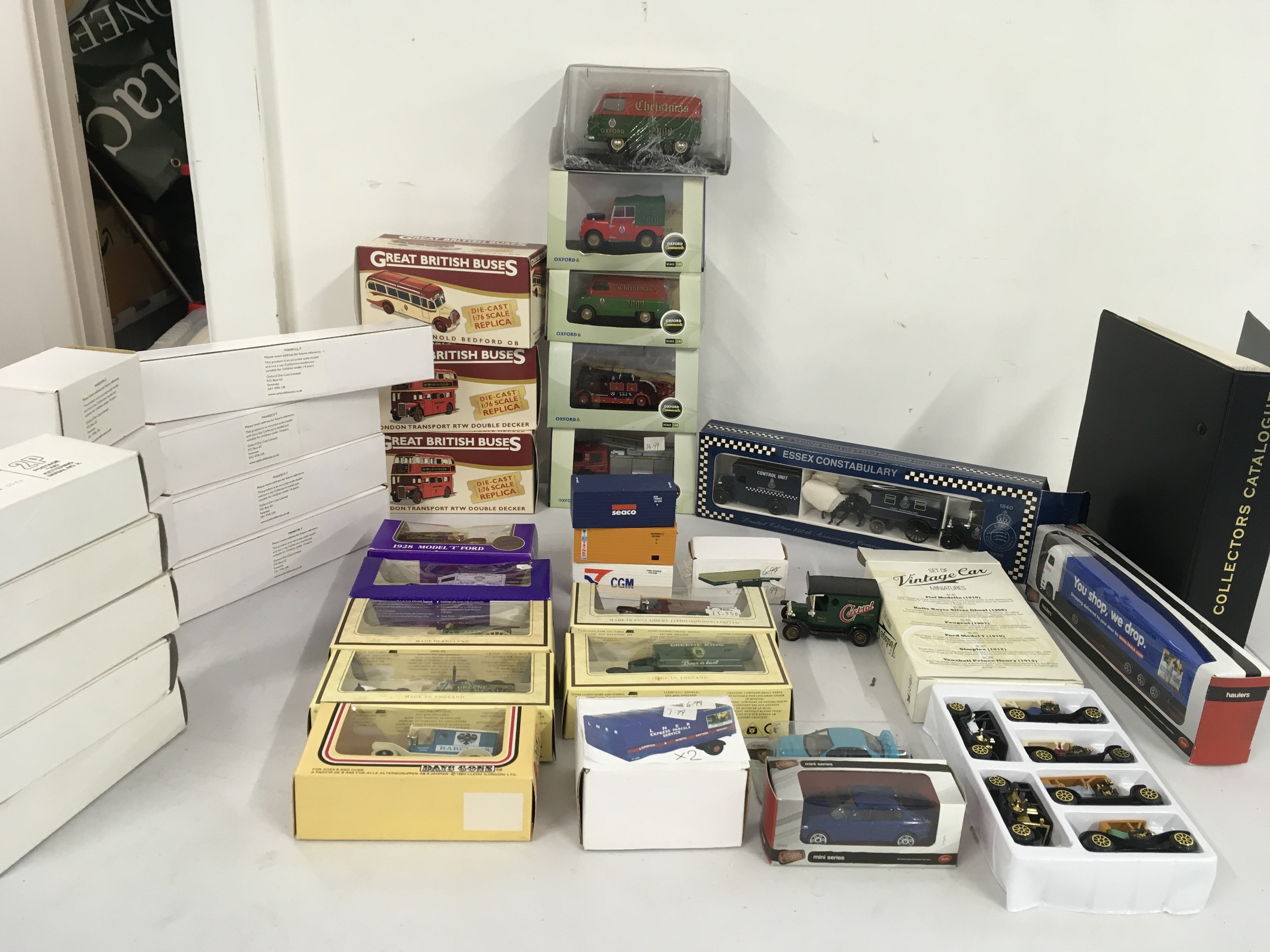 A collection of mainly boxed diecast model vehicles by Oxford..Atlas..Lledo etc. includes Oxford diecast collectors catalogue. no reserve