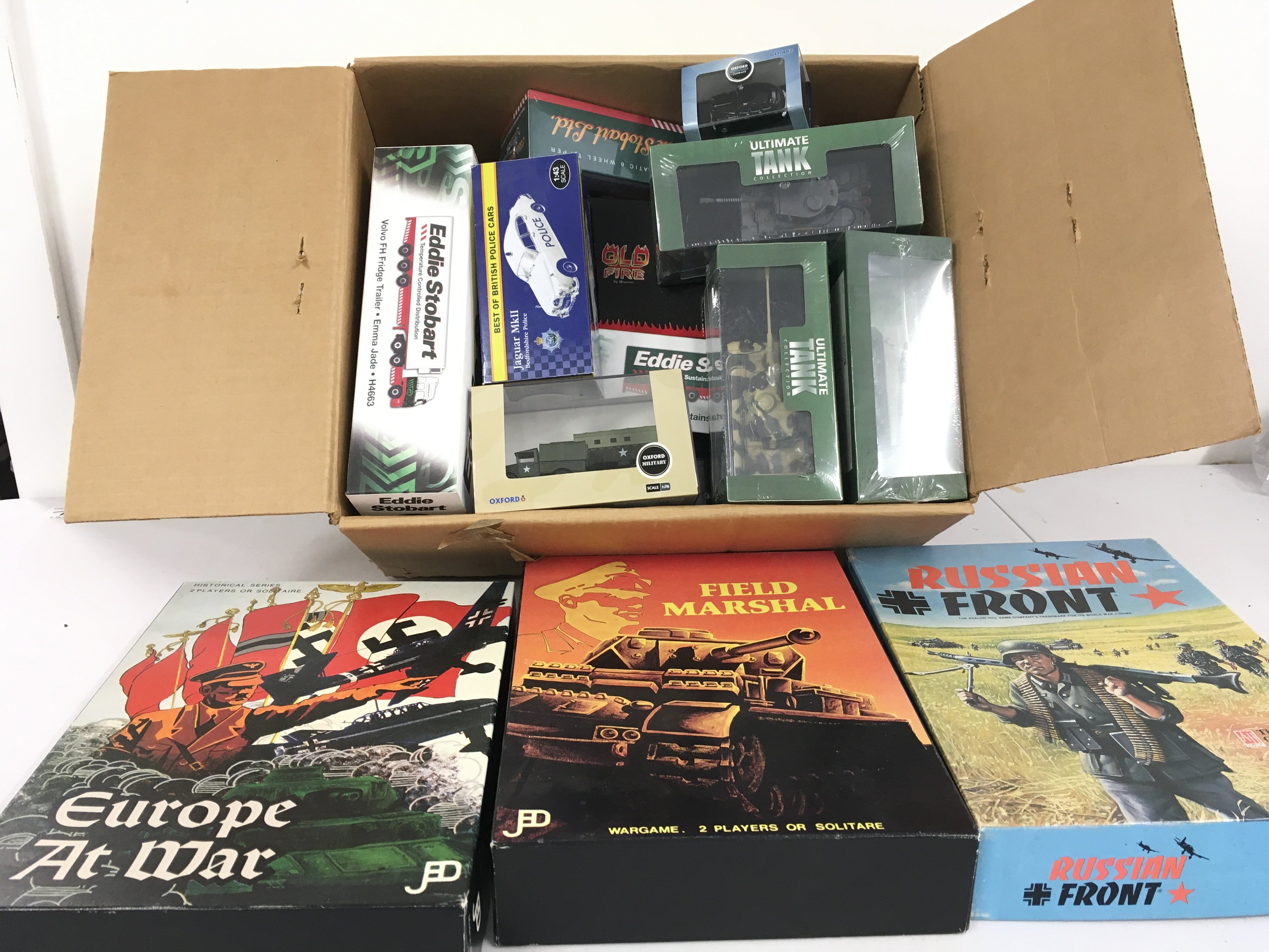 A collection of boxed diecast model vehicles by Atlas..Oxford etc which includes some military includes several loose Playworn vehicles. Also 3 boxed war games. No reserve