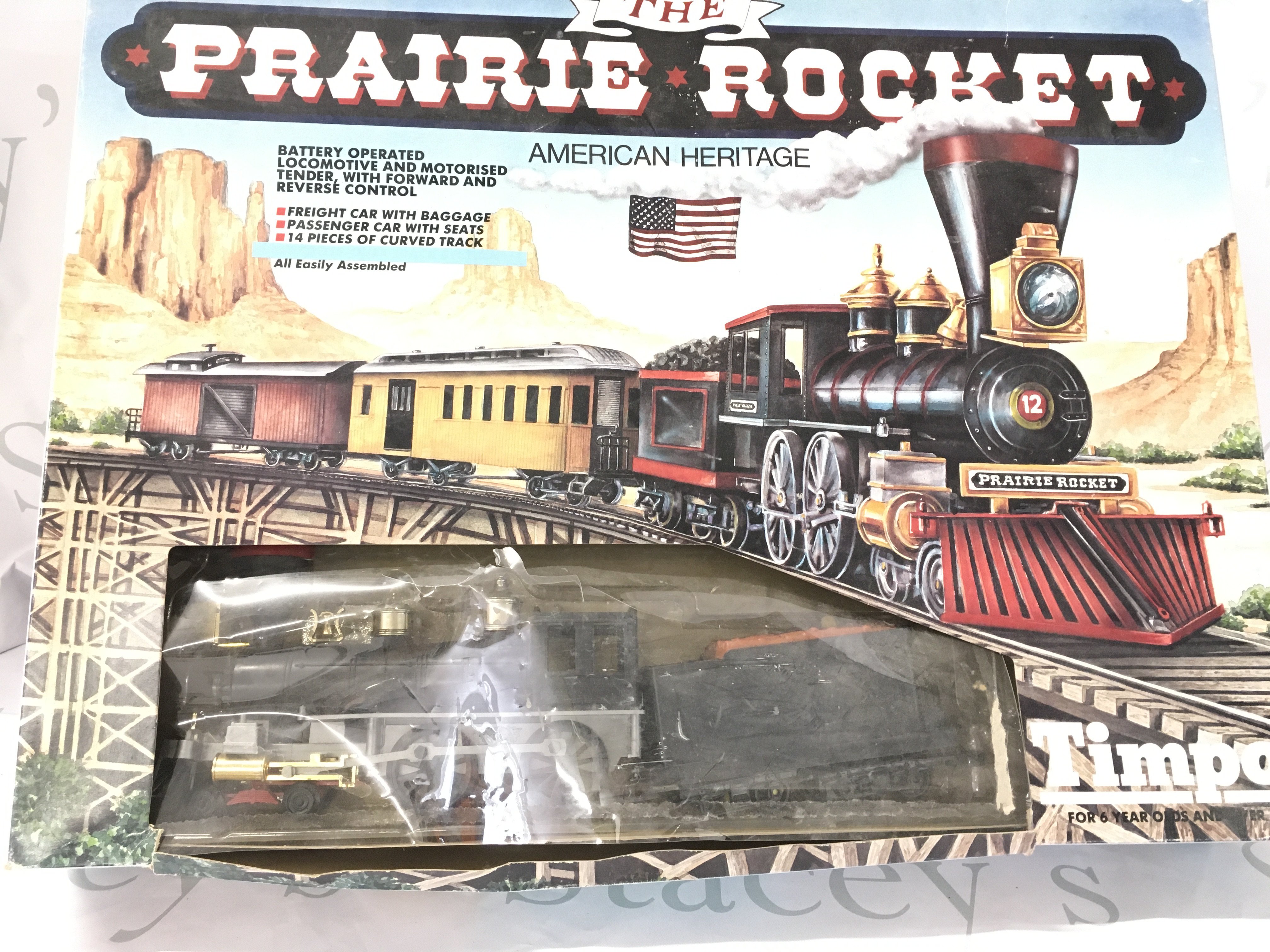 A Boxed Timpo The Prairie Rocket (Box Worn and Parts Missing). And A Hornby Daylight Pacific Express Set(Parts Missing). No Reserve. (2).