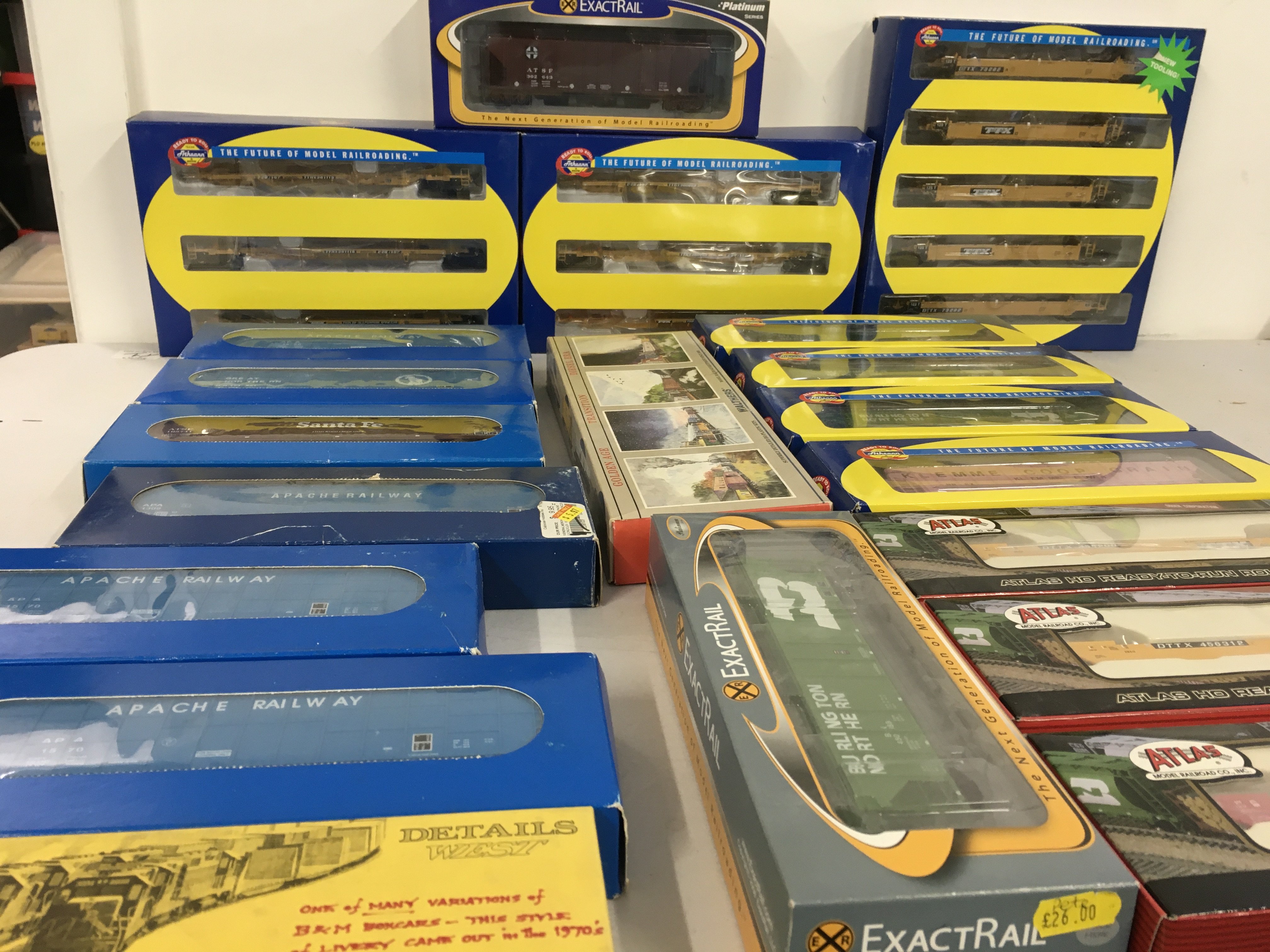 Collection of boxed HO gauge model railway model kits and ready to run rolling stock. Manufacturers include Atlas..Athearn..EC..Walthers etc. no reserve