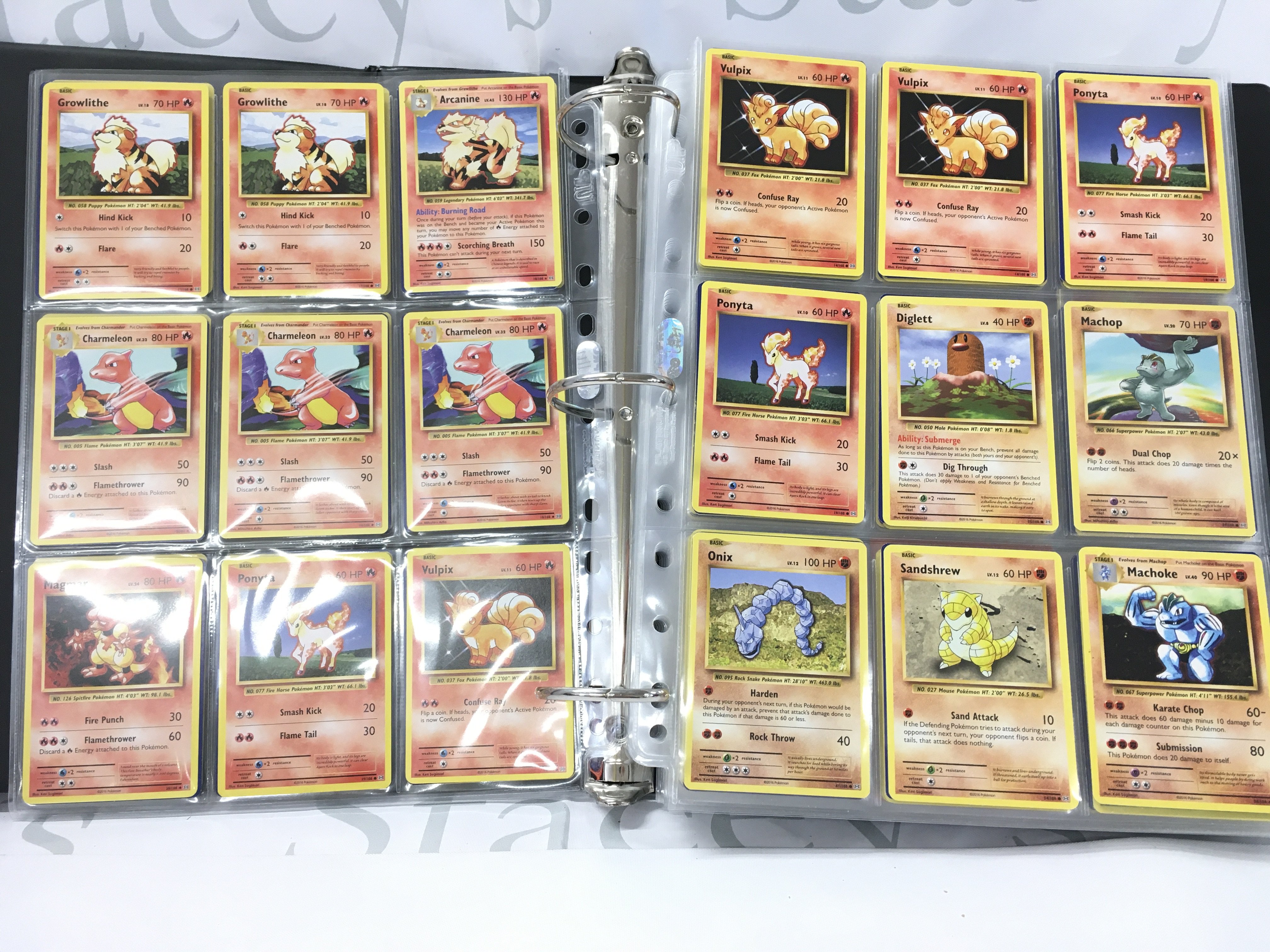 A Binder Containing Both G1 And Modern Pokemon Cards.
