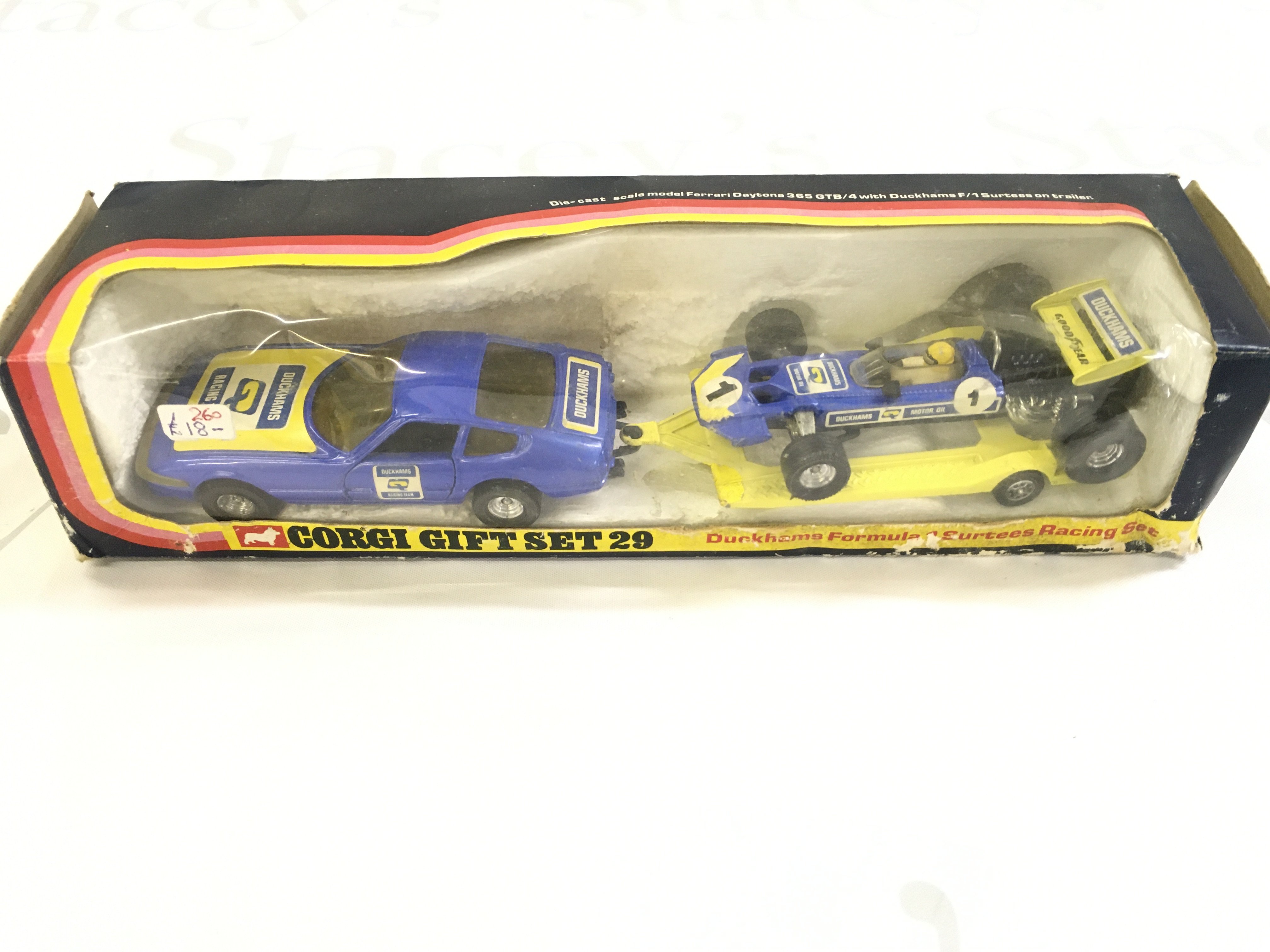 A Boxed Corgi Gift Set 29 Duckhams Formula 1 Surtees Racing Set. Box Is Worn.