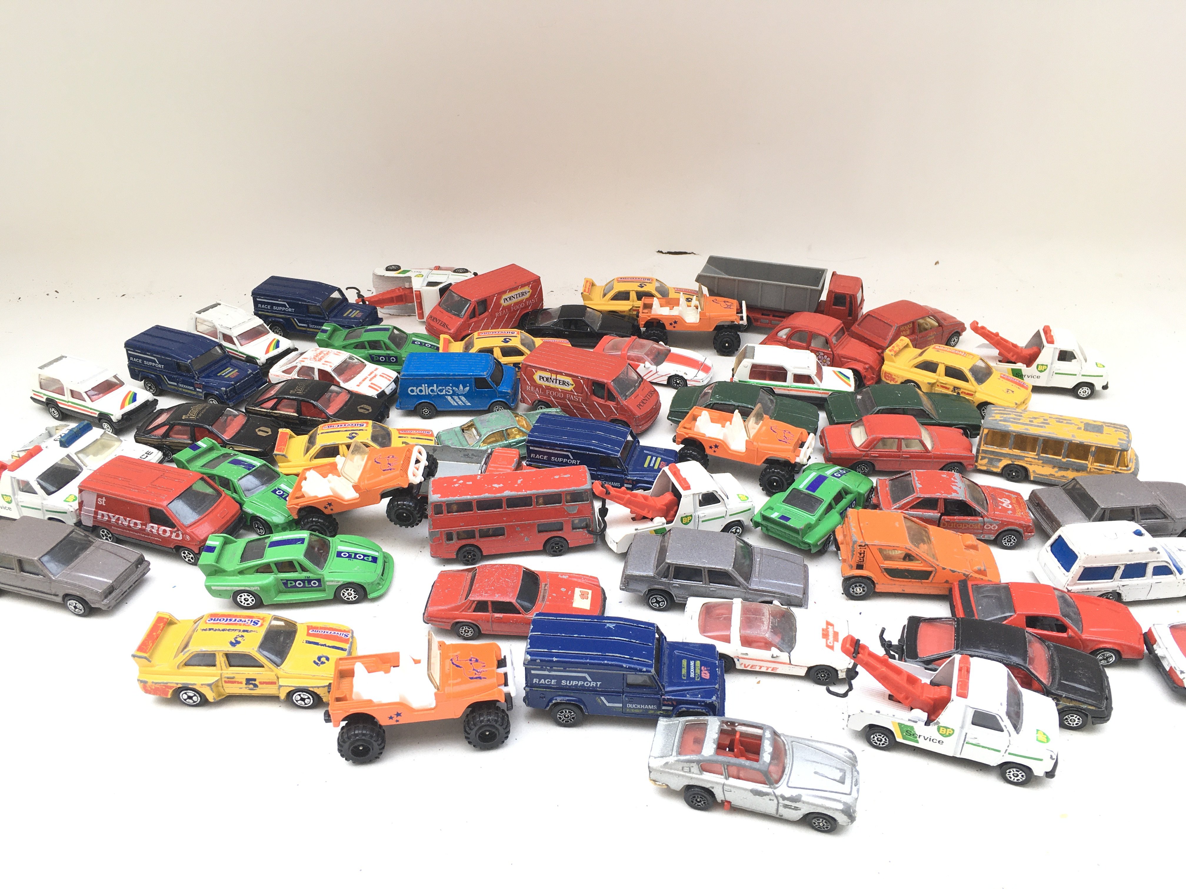 A Box Containing Playworn Corgi Diecast.