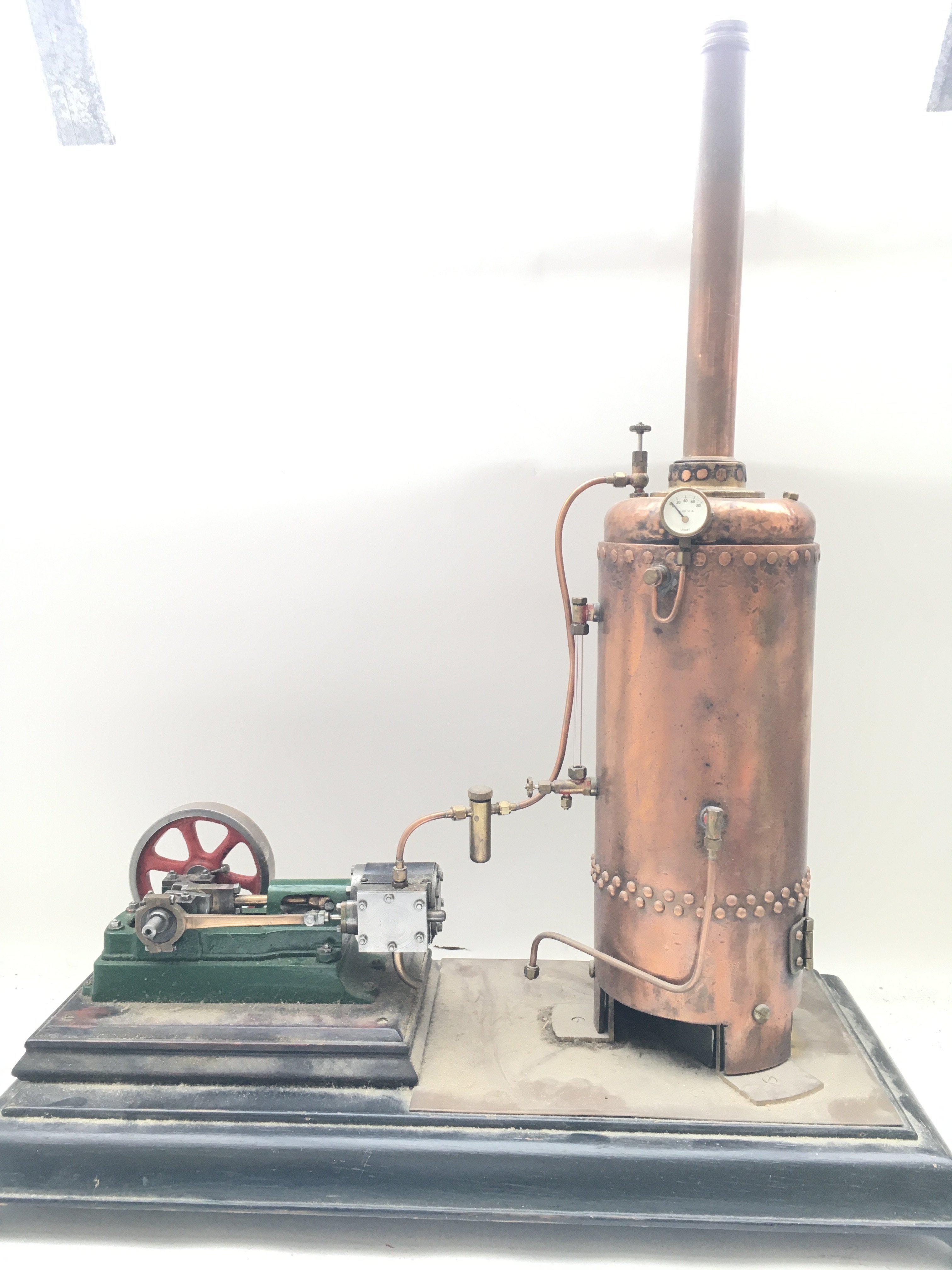 A Model Stuart Steam Boiler On Plinth Base. Approx Height 63CM And Length 53CM.