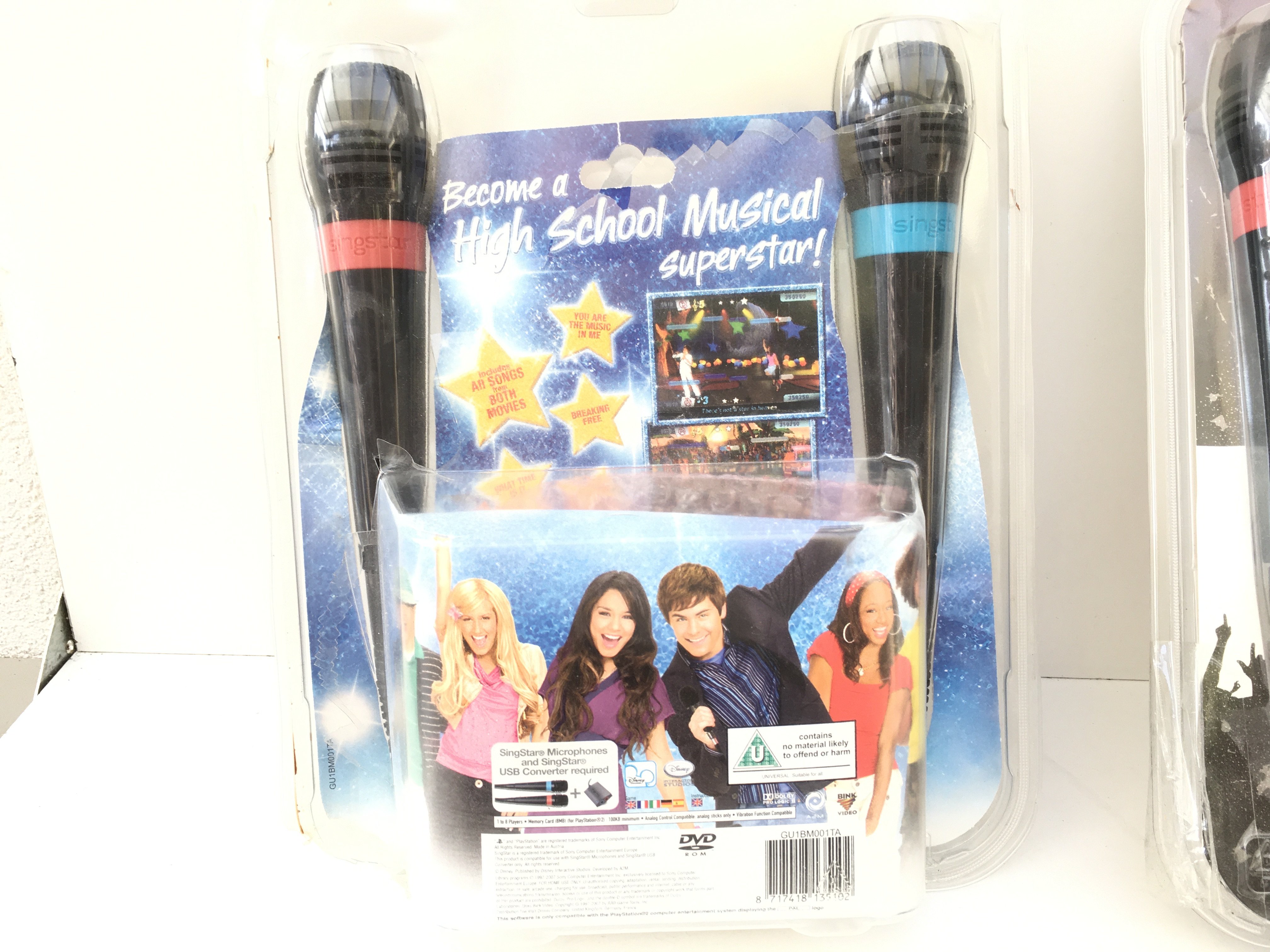 2x Singstar karioke packs 1 with PlayStation 2 disc High School Musical. The 2nd missing disc. 2 microphones in each pack. No reserve