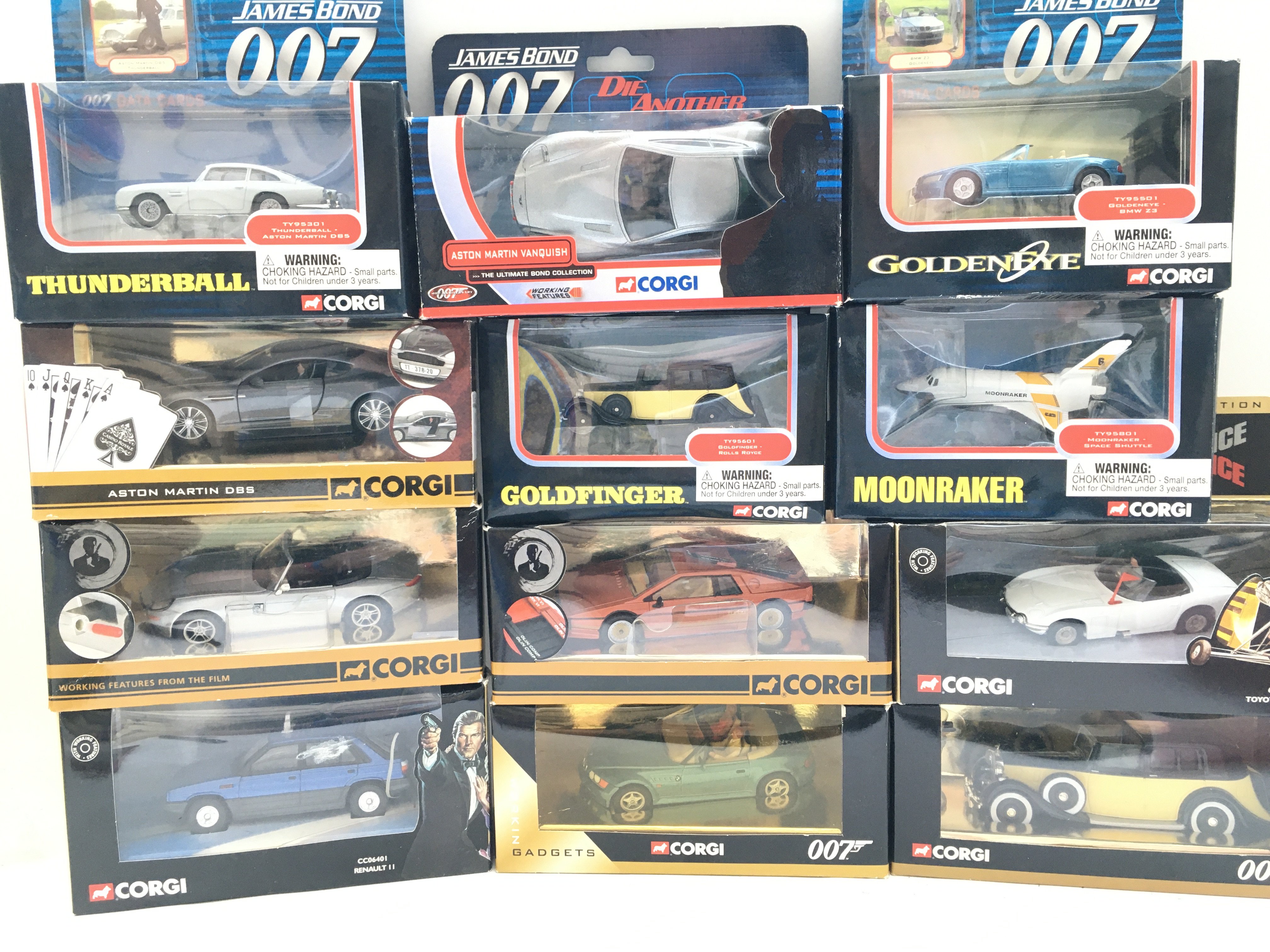 A Collection of Boxed Corgi James Bond Cars. And James Bond Shell Collection.