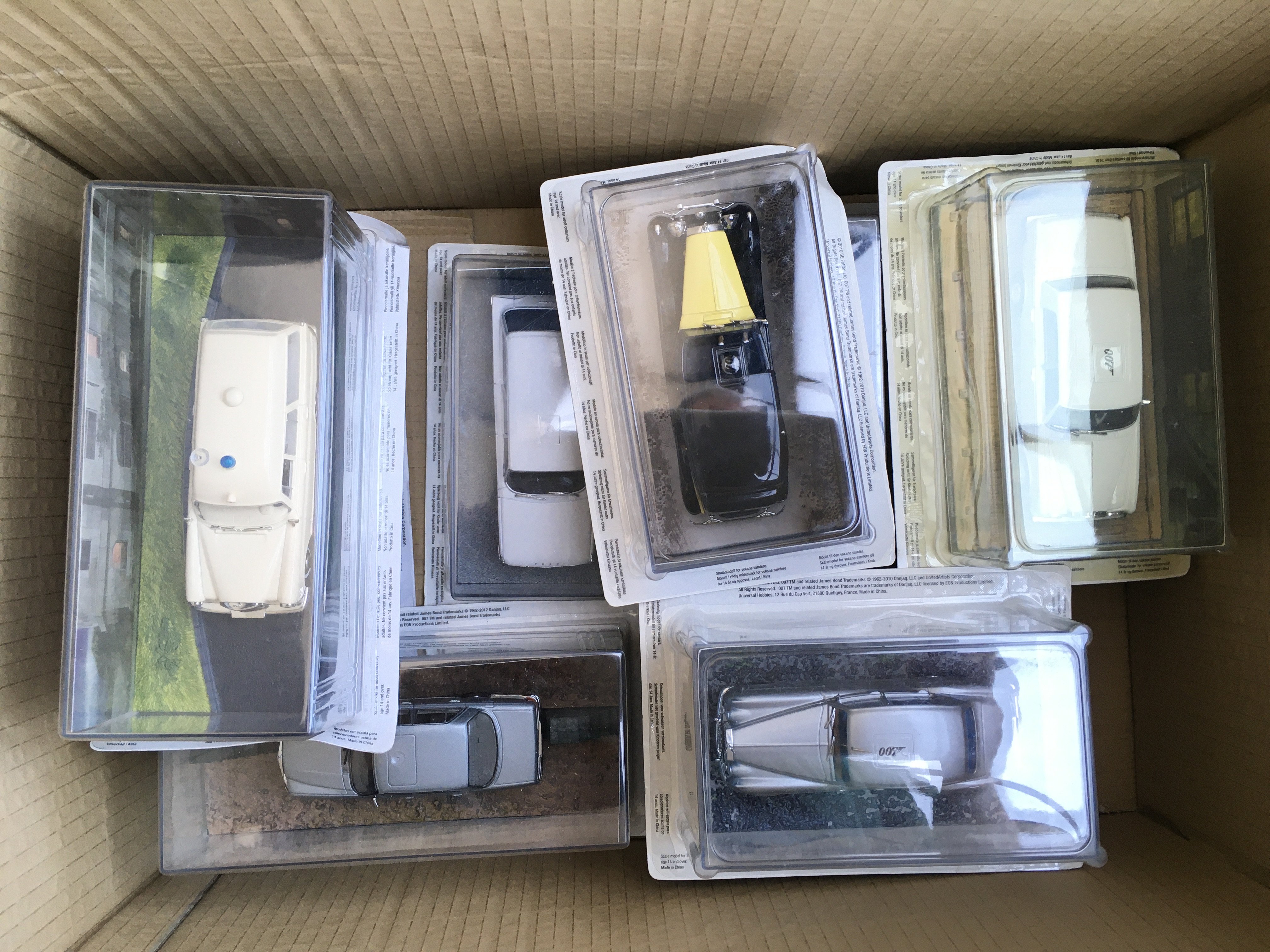 6 Boxes Containing the Complete James Bond Car Collection. (6).
