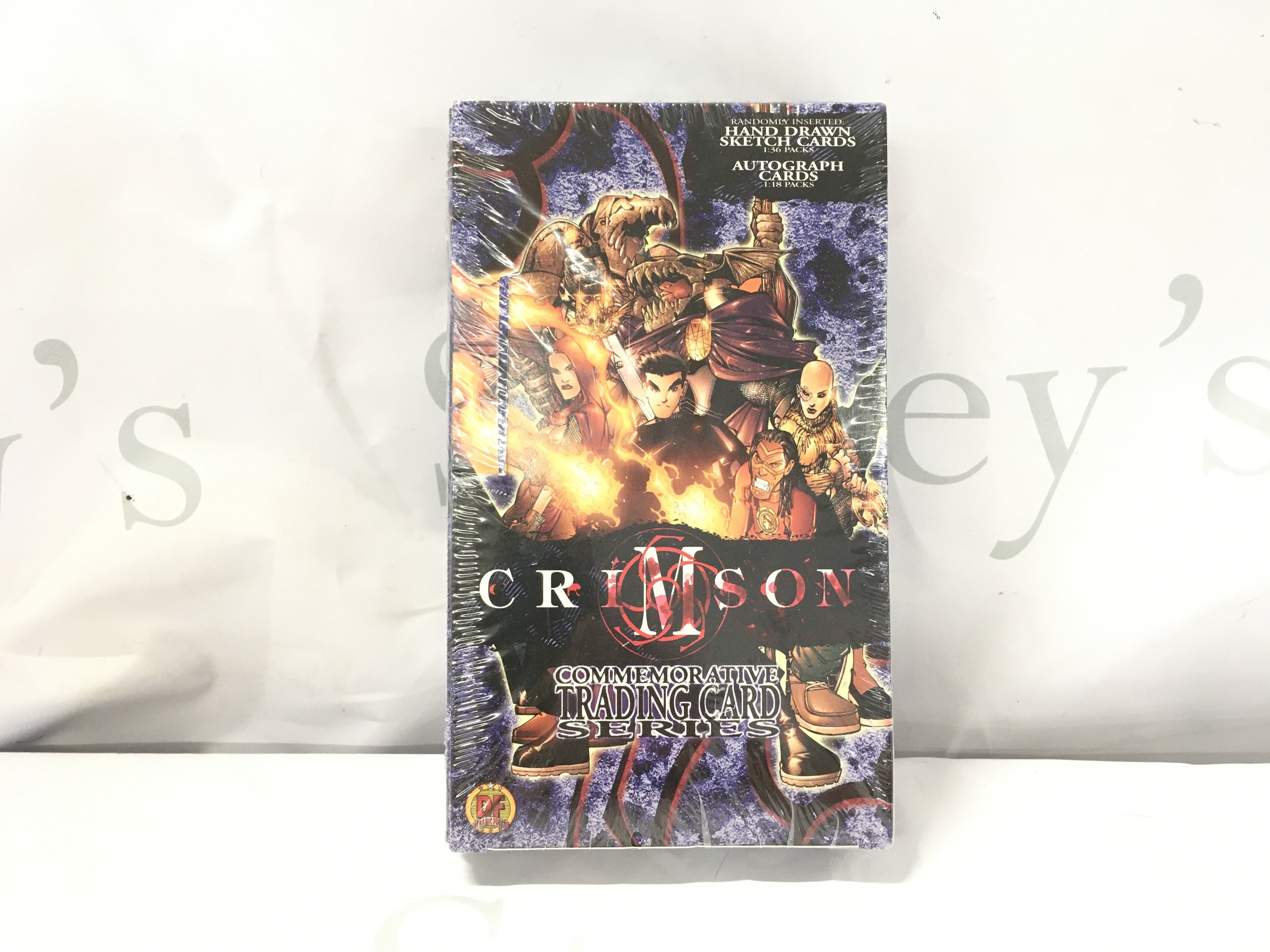 A Boxed And Sealed Crimson Trading Card Game.