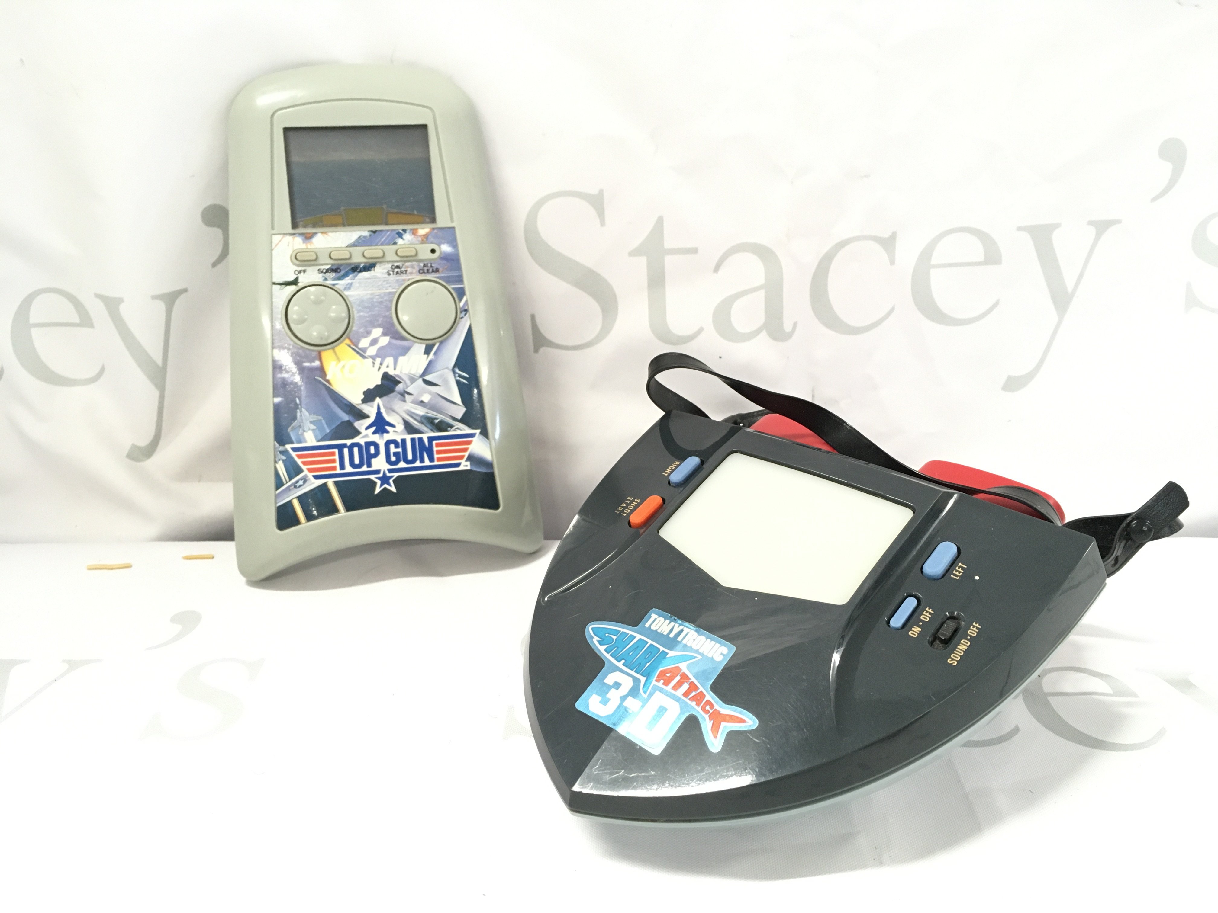 A Konami Top Gun Handheld lcd Game and a Tomytronic Shark Attack 3-D. No Reserve.