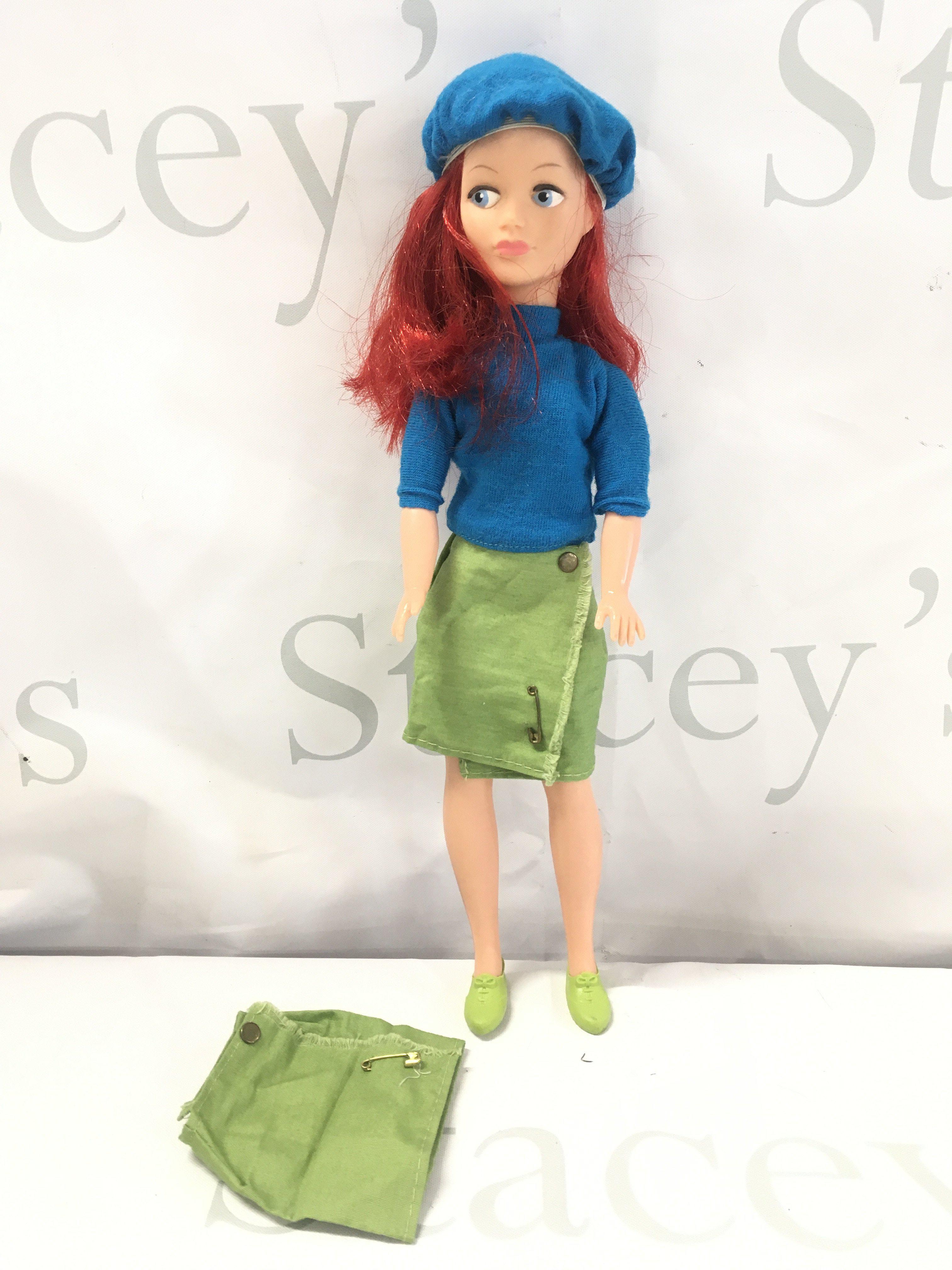 A Vintage Pedigree Sindy Mitzi Doll in Dark Blue Top And Beret. Also With Spare Skirt.