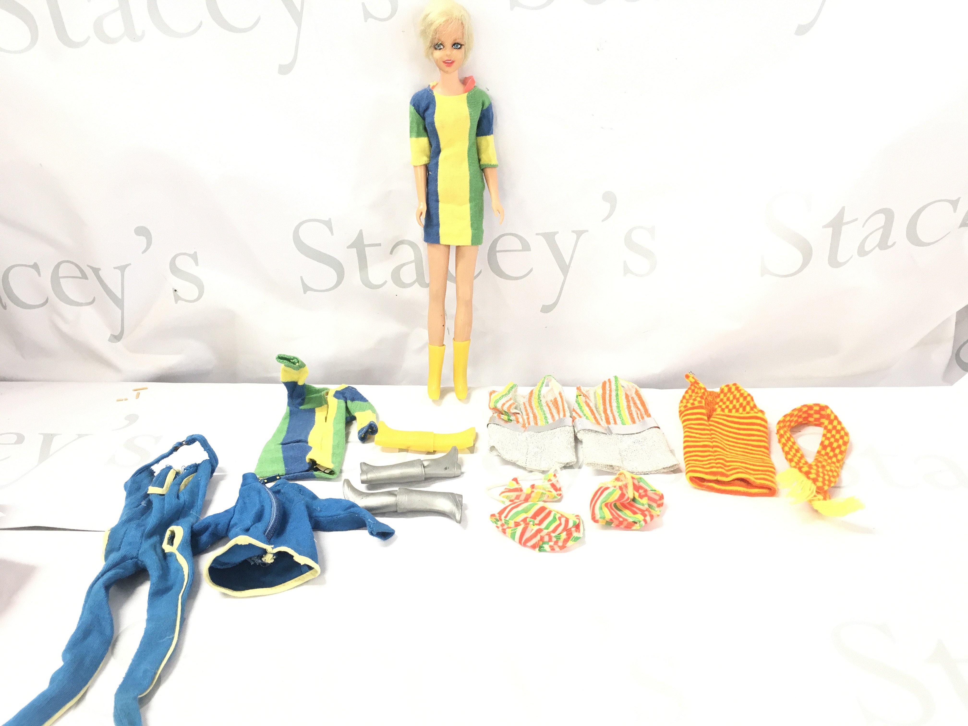 A Vintage Mattel Twist And Turn Barbie Twiggy Doll With Extra Clothes.