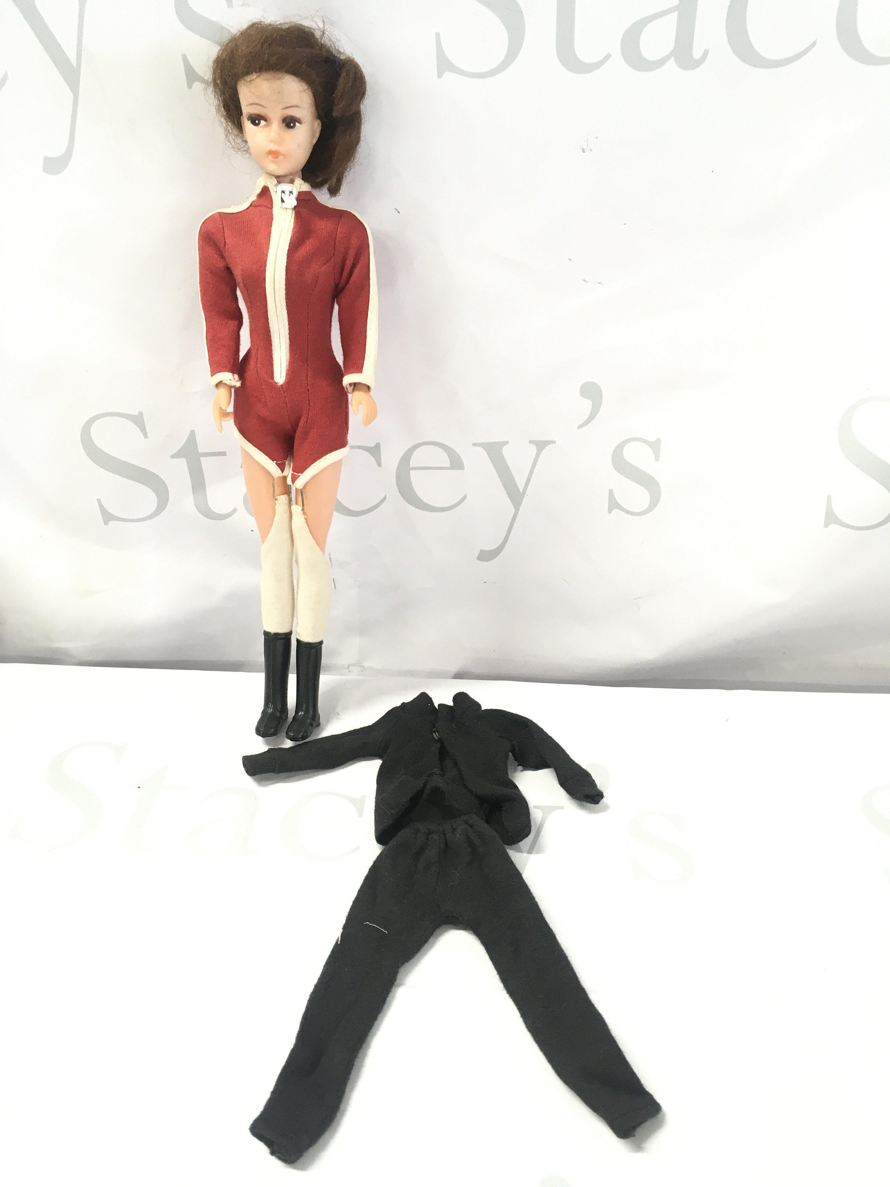 A 1966 The Avengers Emma Peel Doll With Extra Clothes.