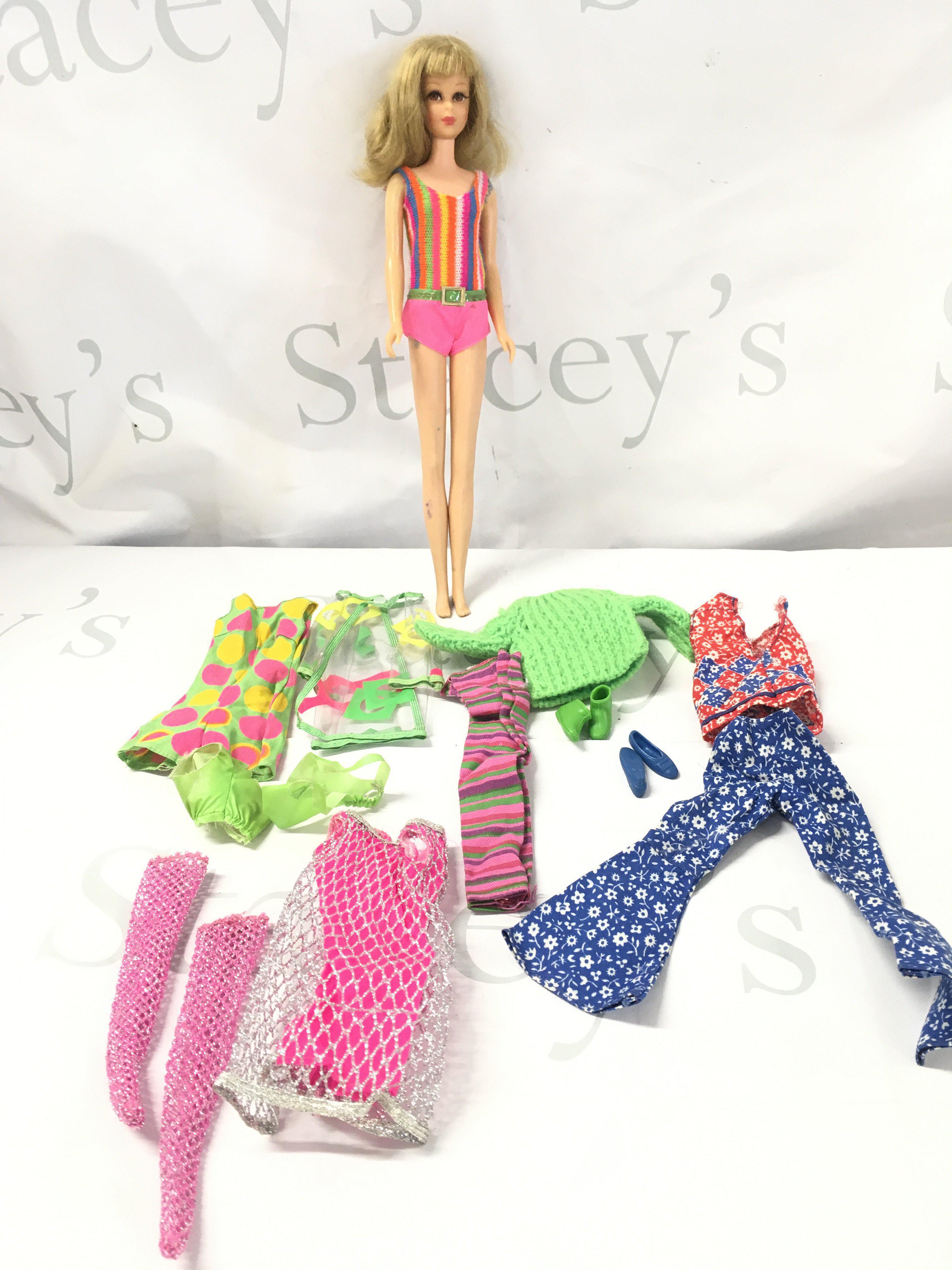 A Vintage Mattel Twist And Turn Francine Doll, with Barbie Clothes.