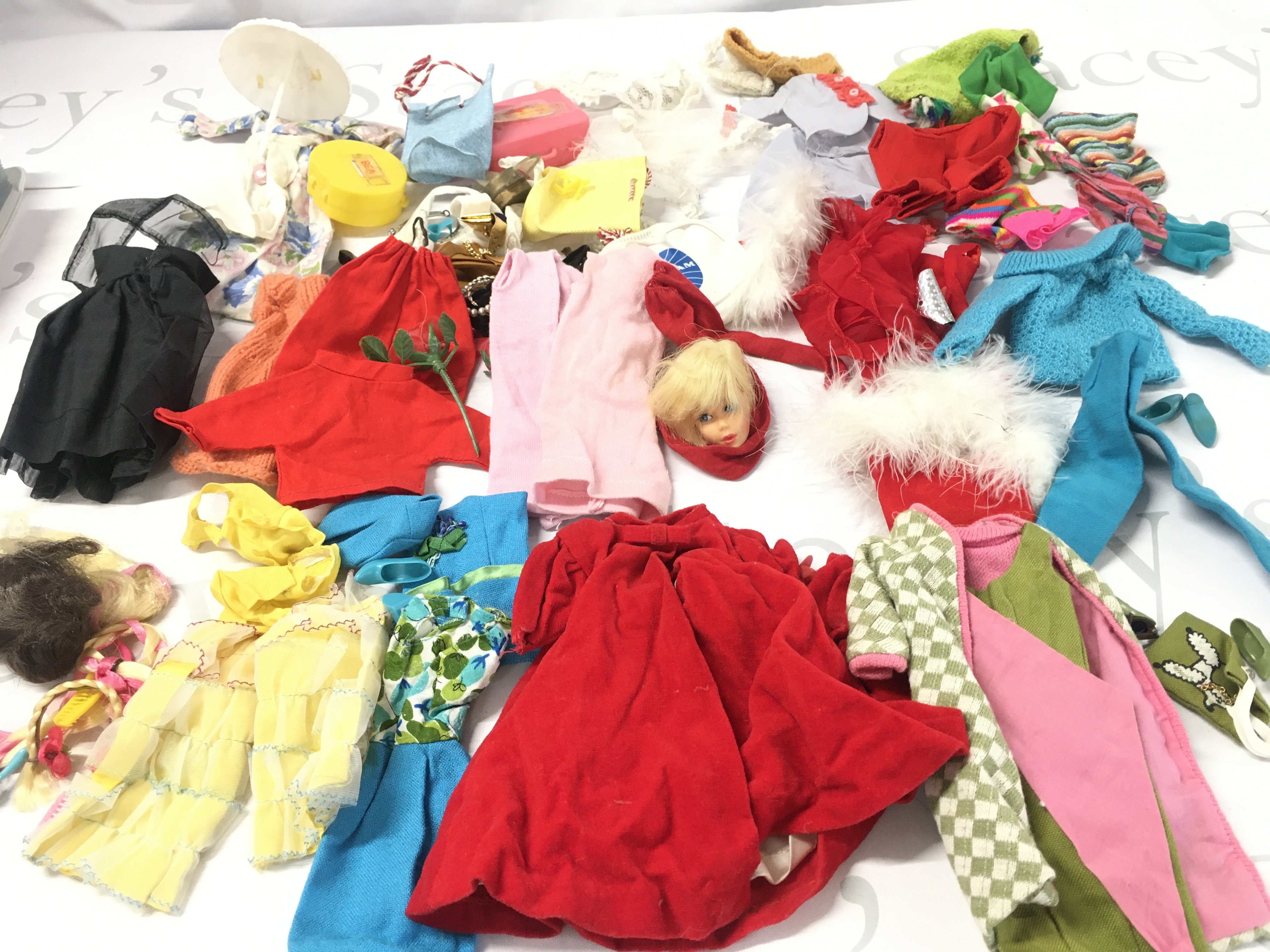 A Collection of Vintage Barbie Clothes.