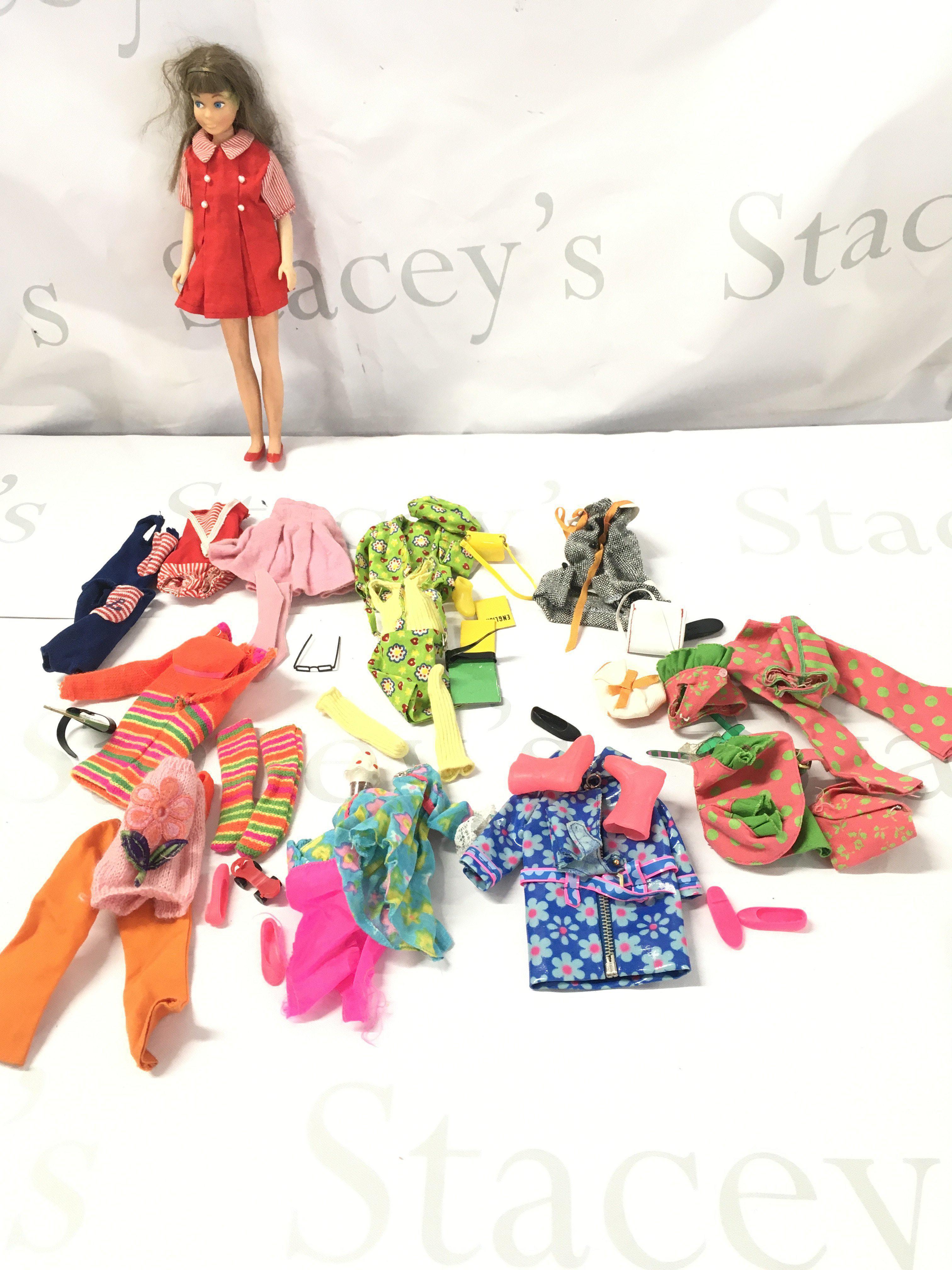 A Vintage Skipper Doll With Clothes.