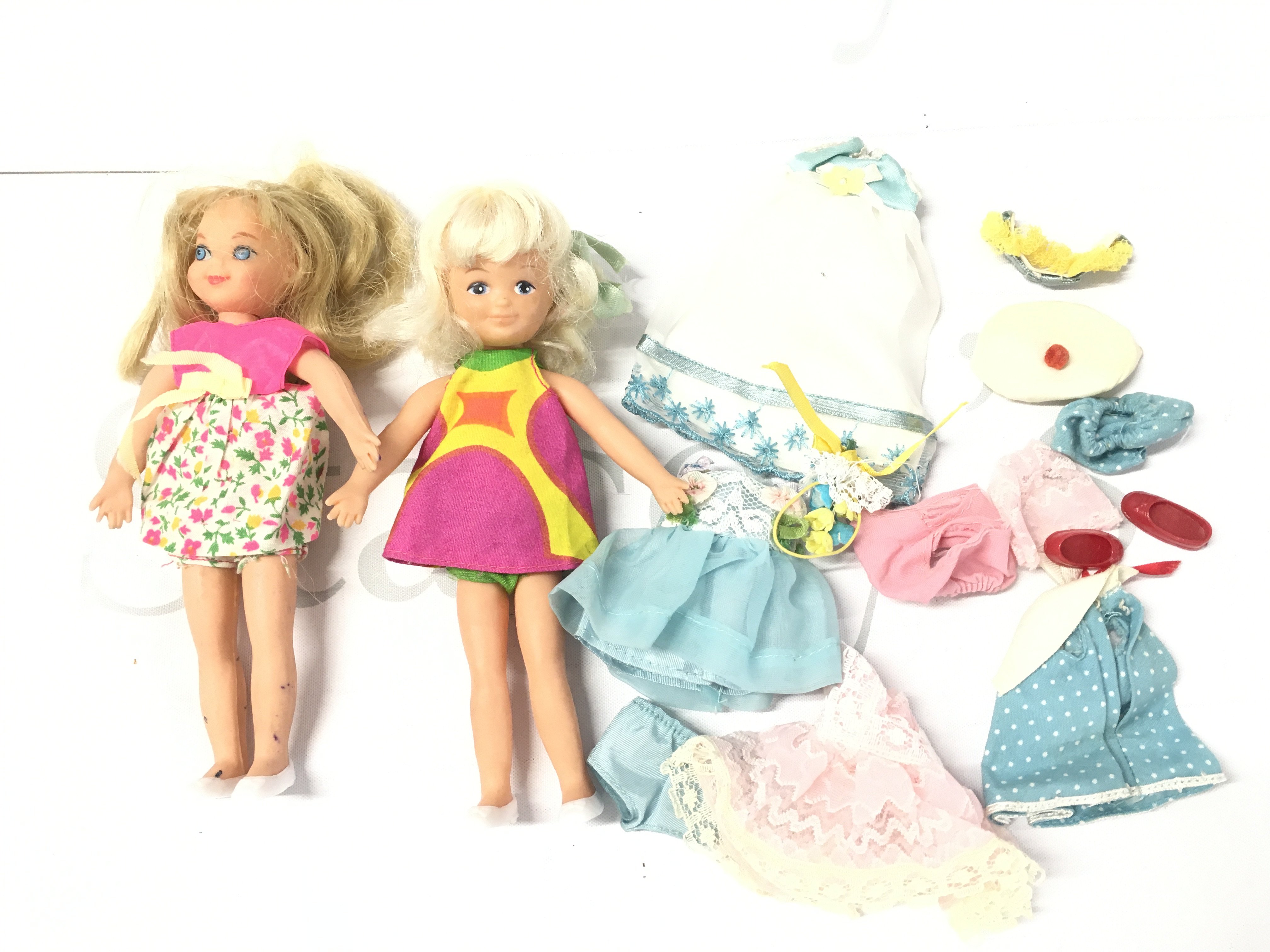 A Barbie Tutti And Chris Dolls With Clothes.