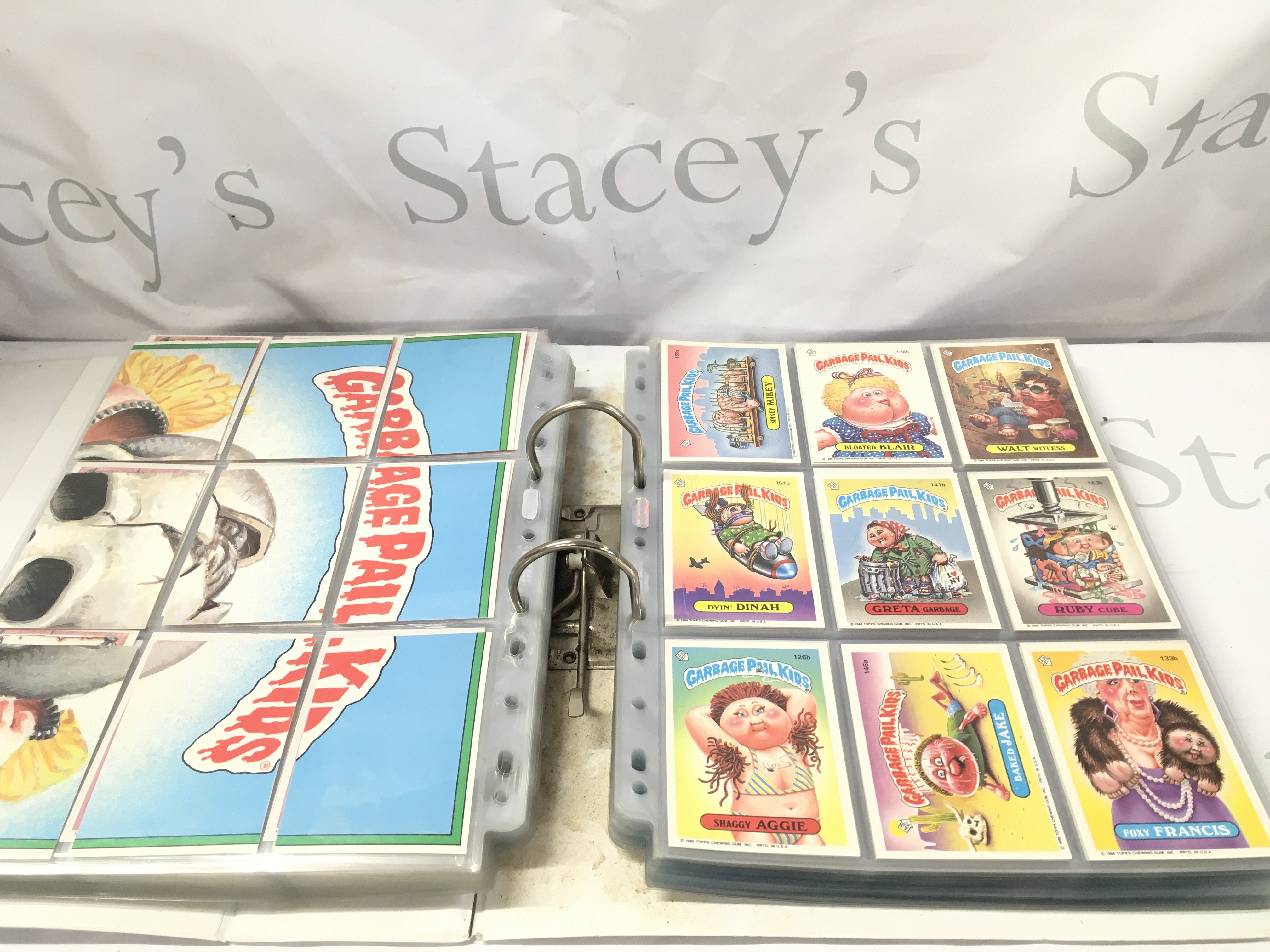 A Binder Containing Vintage And Modern Unused Topps Garbage Pail Kids Stickers. And Some Lord Of The Rings the 3rd Age Cards.