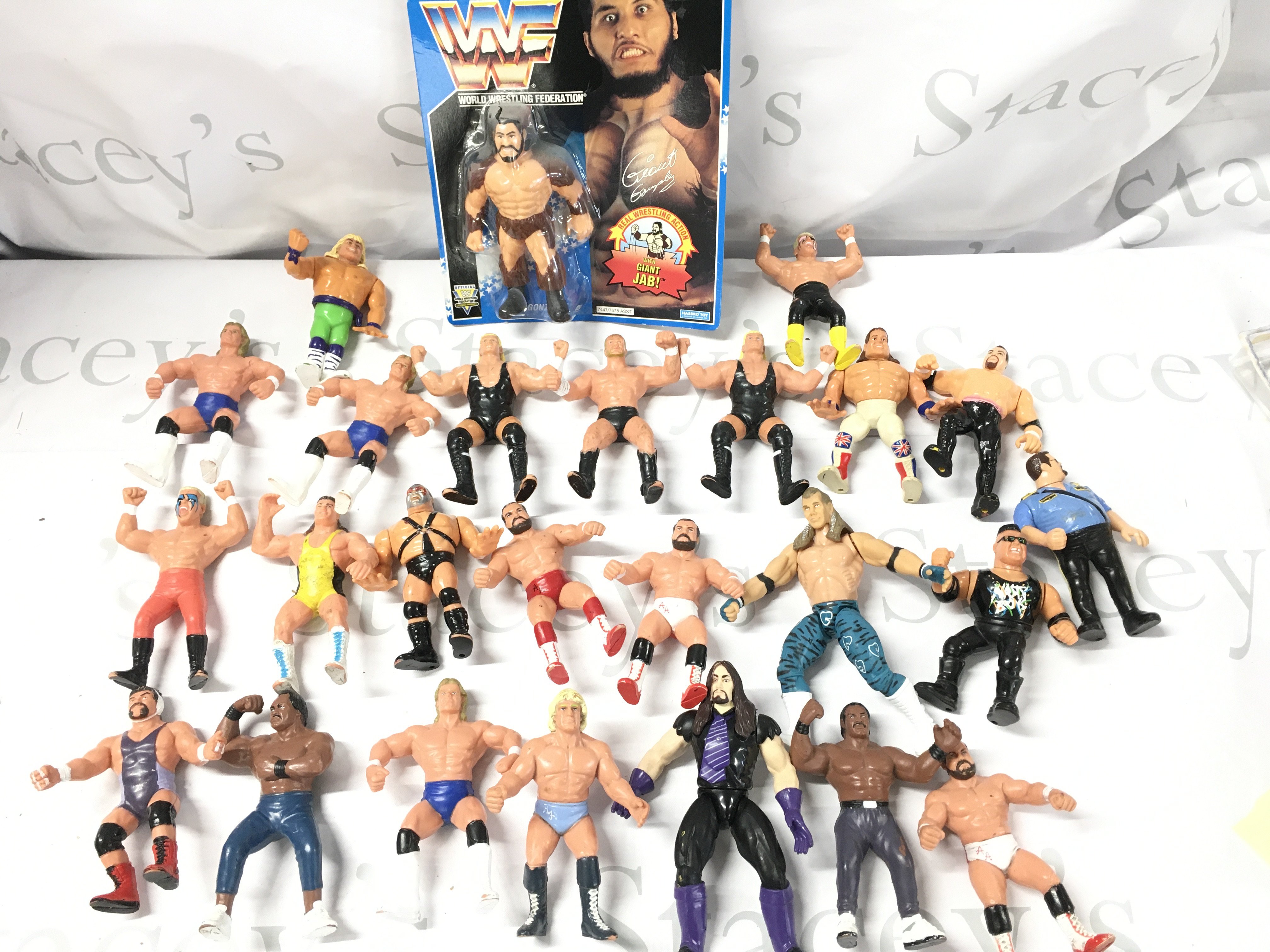 A Carded Hasbro WWF Giant Gonzalez Figure (Blister Damaged) And Loose Goloob Figures.