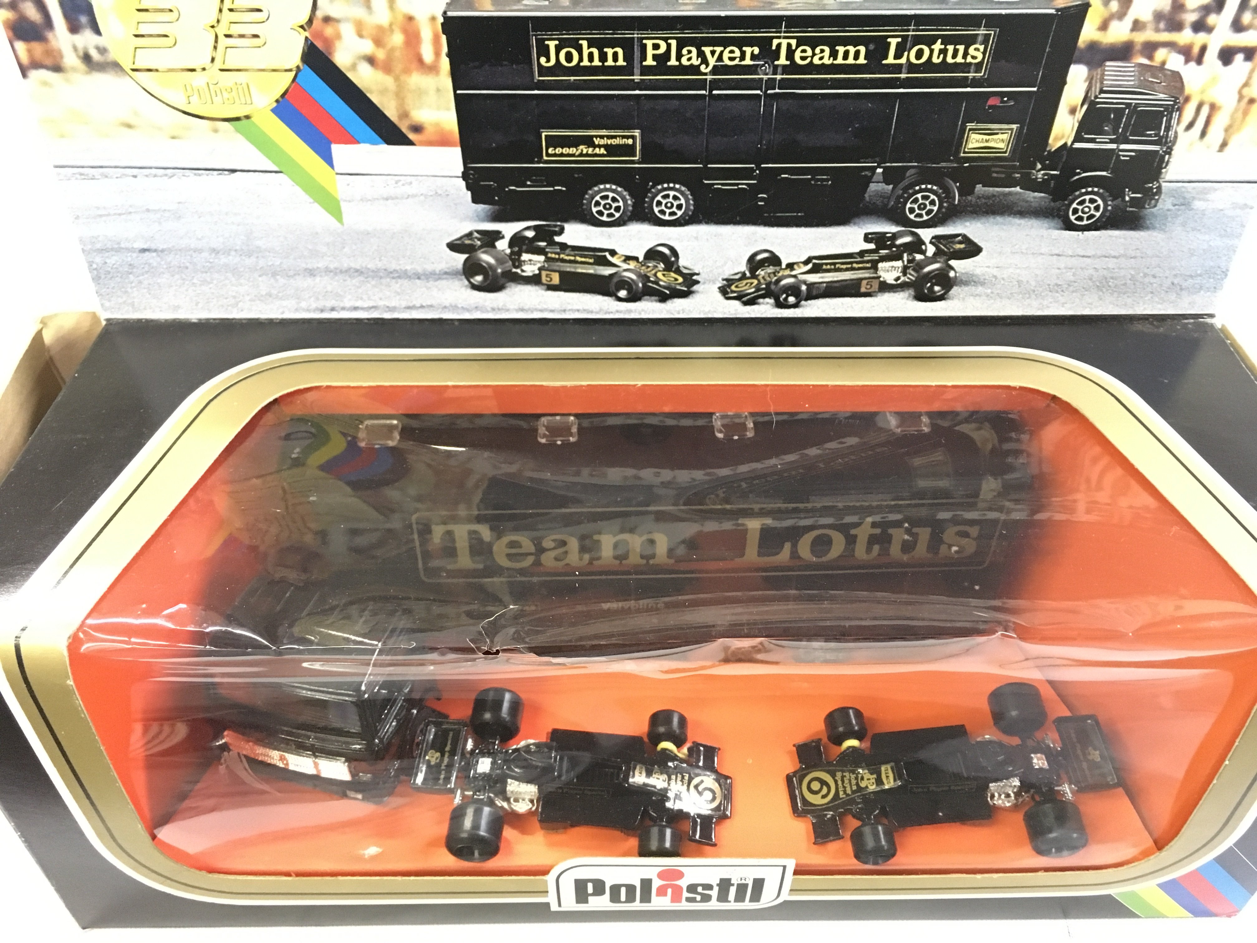 A Boxed Polistil Lotus JPS F1 Team Transporter and Cars. #RJ107.