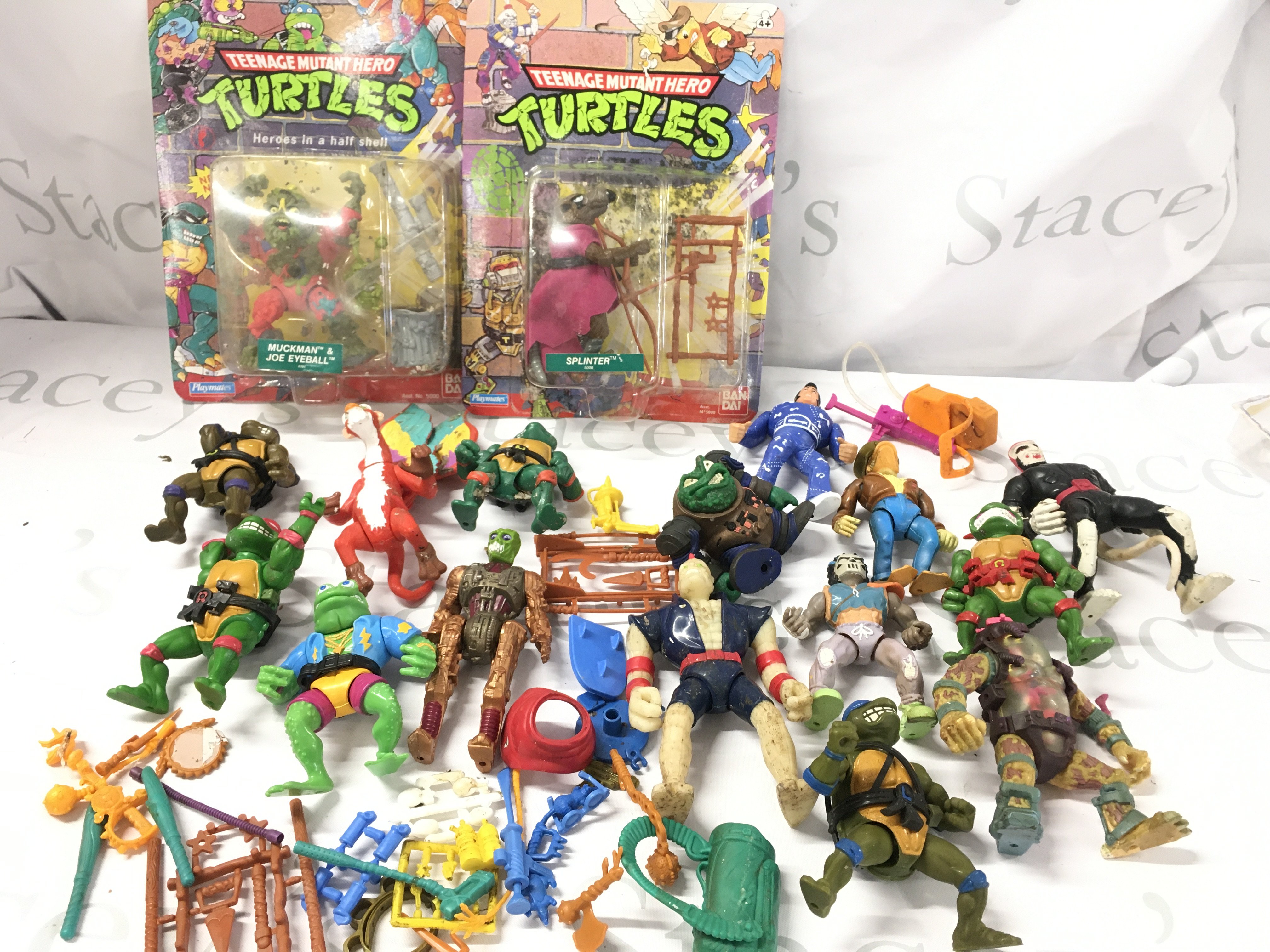 2 Carded Playmates Teenage Mutant Hero Turtles Figures (Some Damp Damage) And A Collection of Loose Figures.
