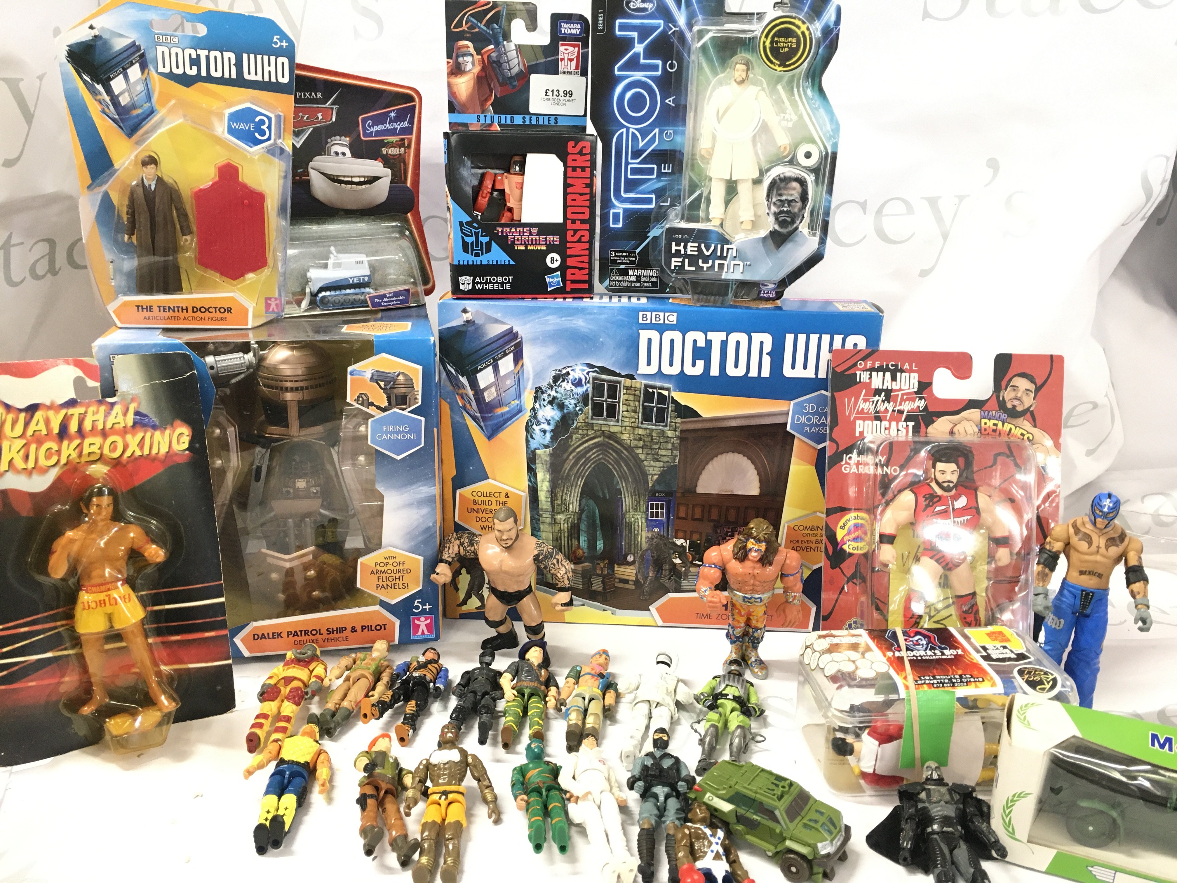 A Collection of Various Bo Ed And Loose Toys. Includes G.I.Joe. Doctor Who Tron Etc. No Reserve.
