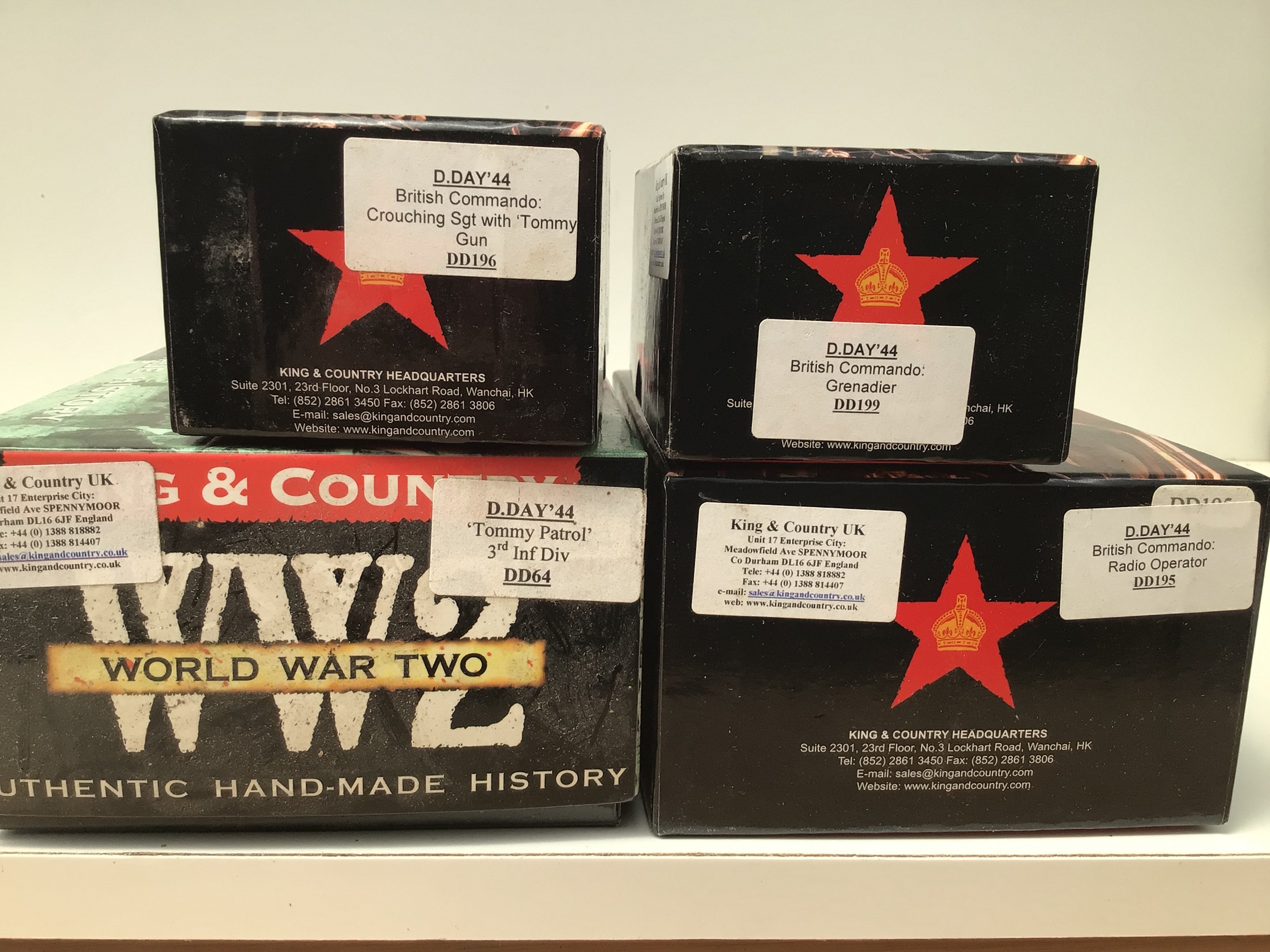 4x boxed King and Country Minature Military models from the D Day 1944 series featuring British Commandos. Includes DD195 Bc Radio Operator..DD196 BC crouching sgt with Tommy Gun. DD199 BC Grenadier..DD64. Tommy Patrol.. No reserve