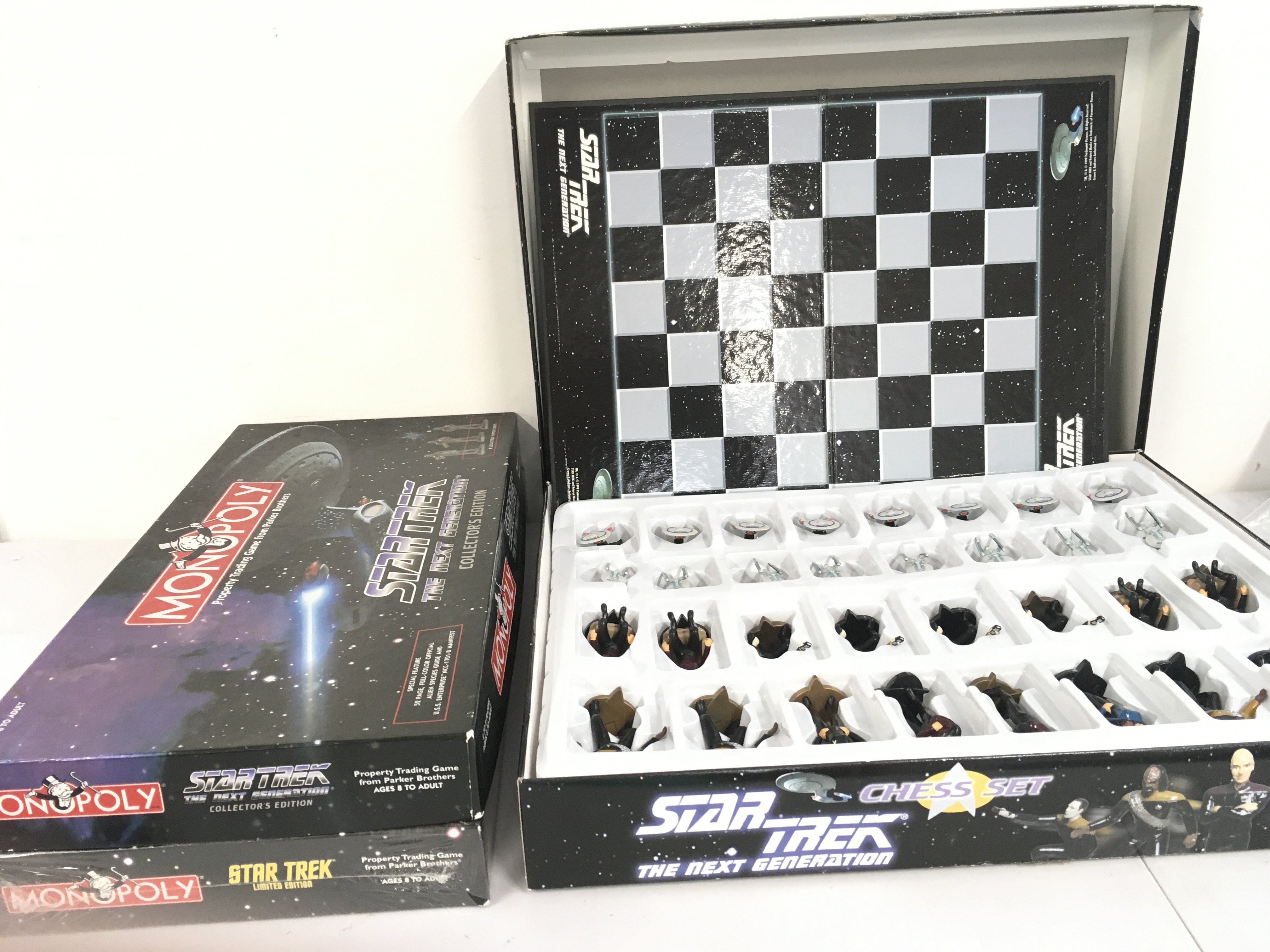 2 x boxed monopoly sets includes sealed box featuring original characters limited edition and an open box featuring the next generation collectors Edition. Also includes boxedStar Trek chess set. No reserve