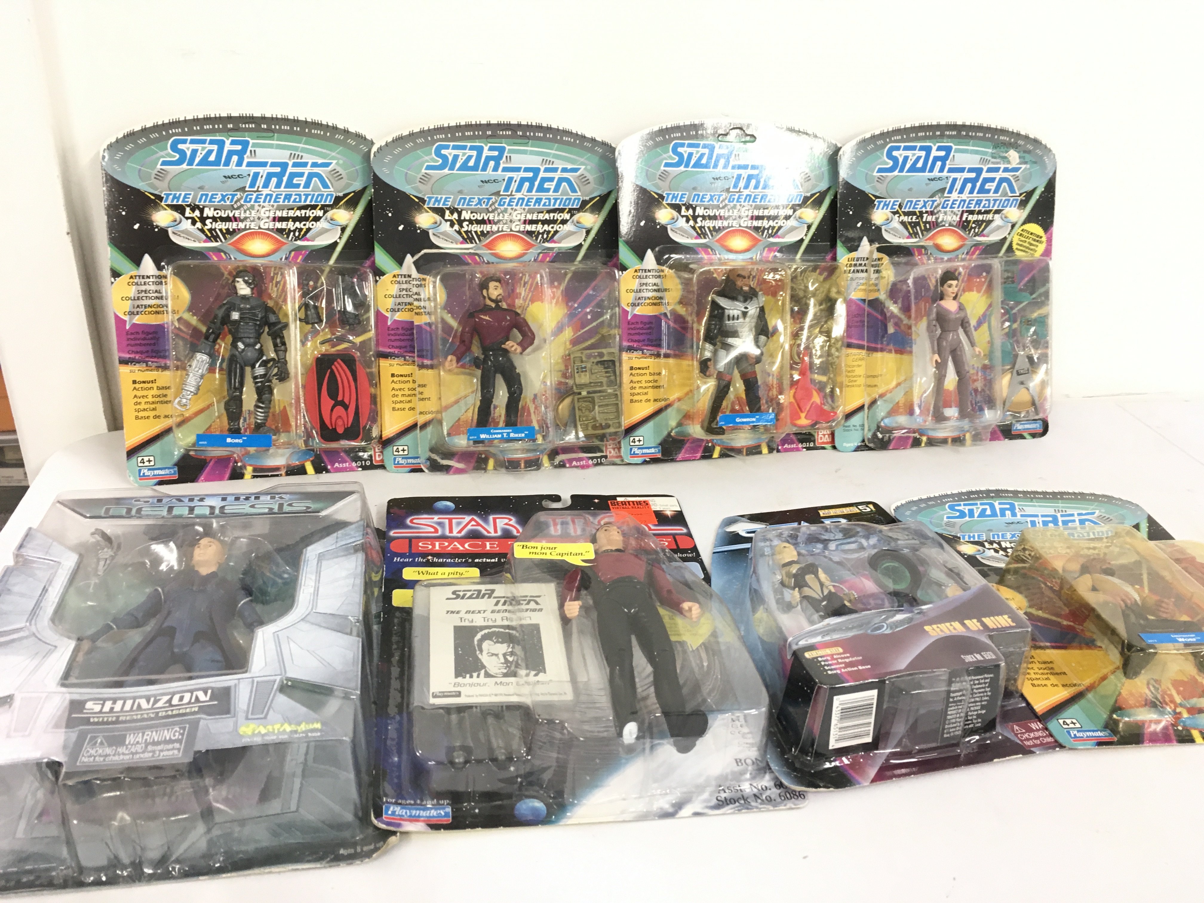 A collection of 8 carded Star a trek action figures featuring The Next Generation and others. Mostly unopened. No reserve