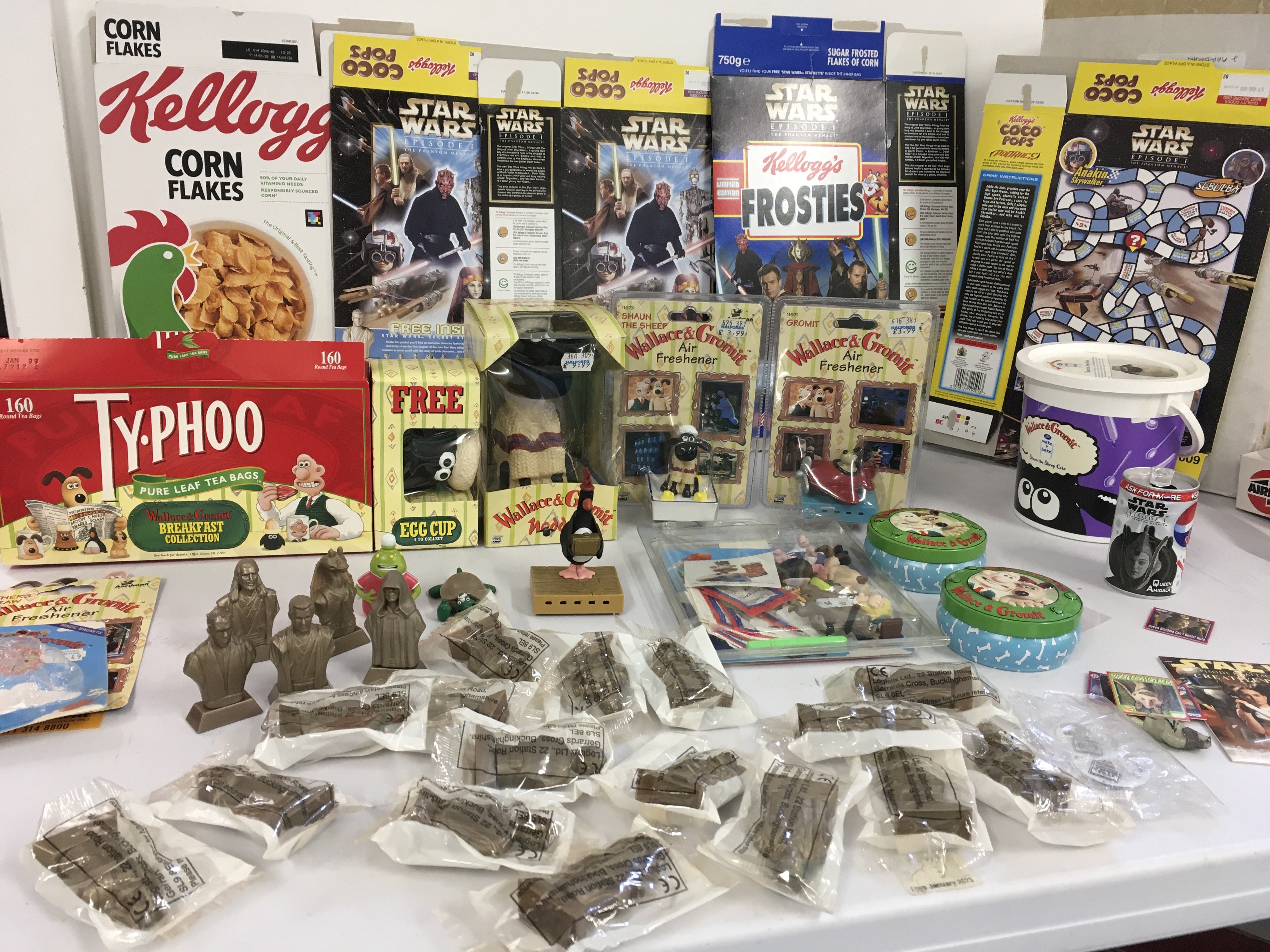 A collection of Wallace and Gromit merchandise also various Star Wars merchandising items.