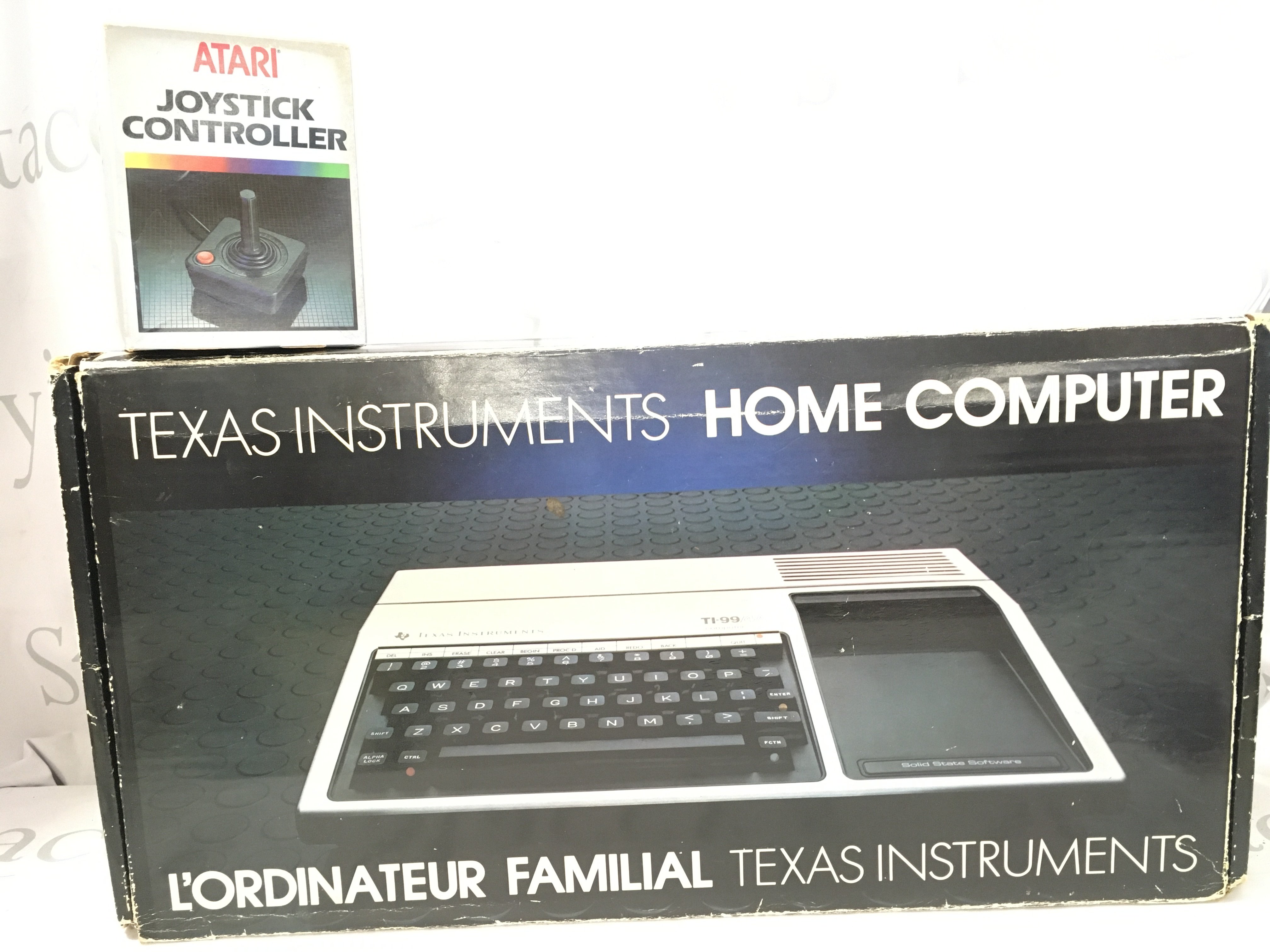 A Boxed Texas Instruments Home Computer With Software And With An Atari Joystick.(2).
