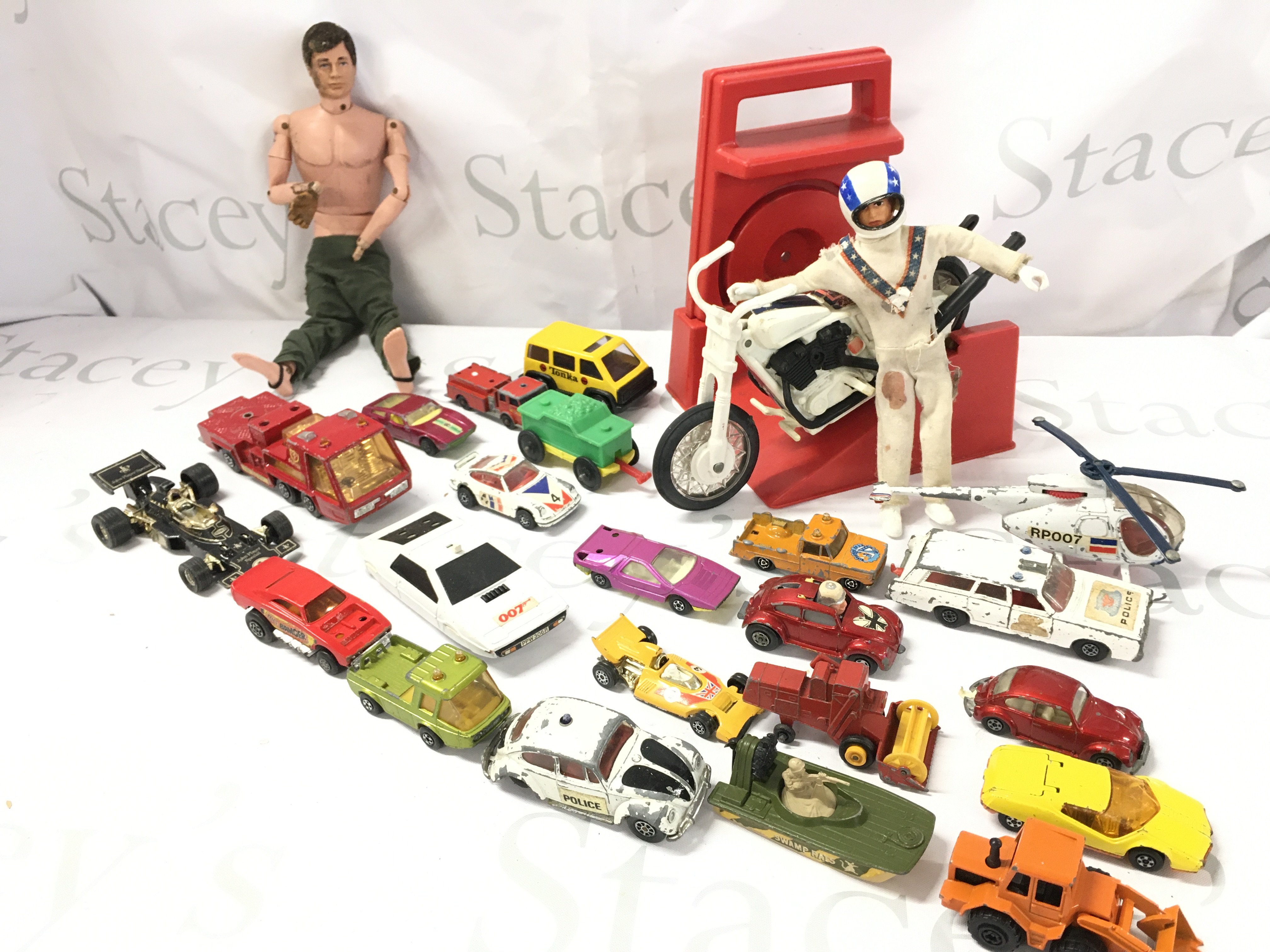 A Collection of Playworn Toys Including Action Man. Evel Knievel and a Collection Of Diecast.