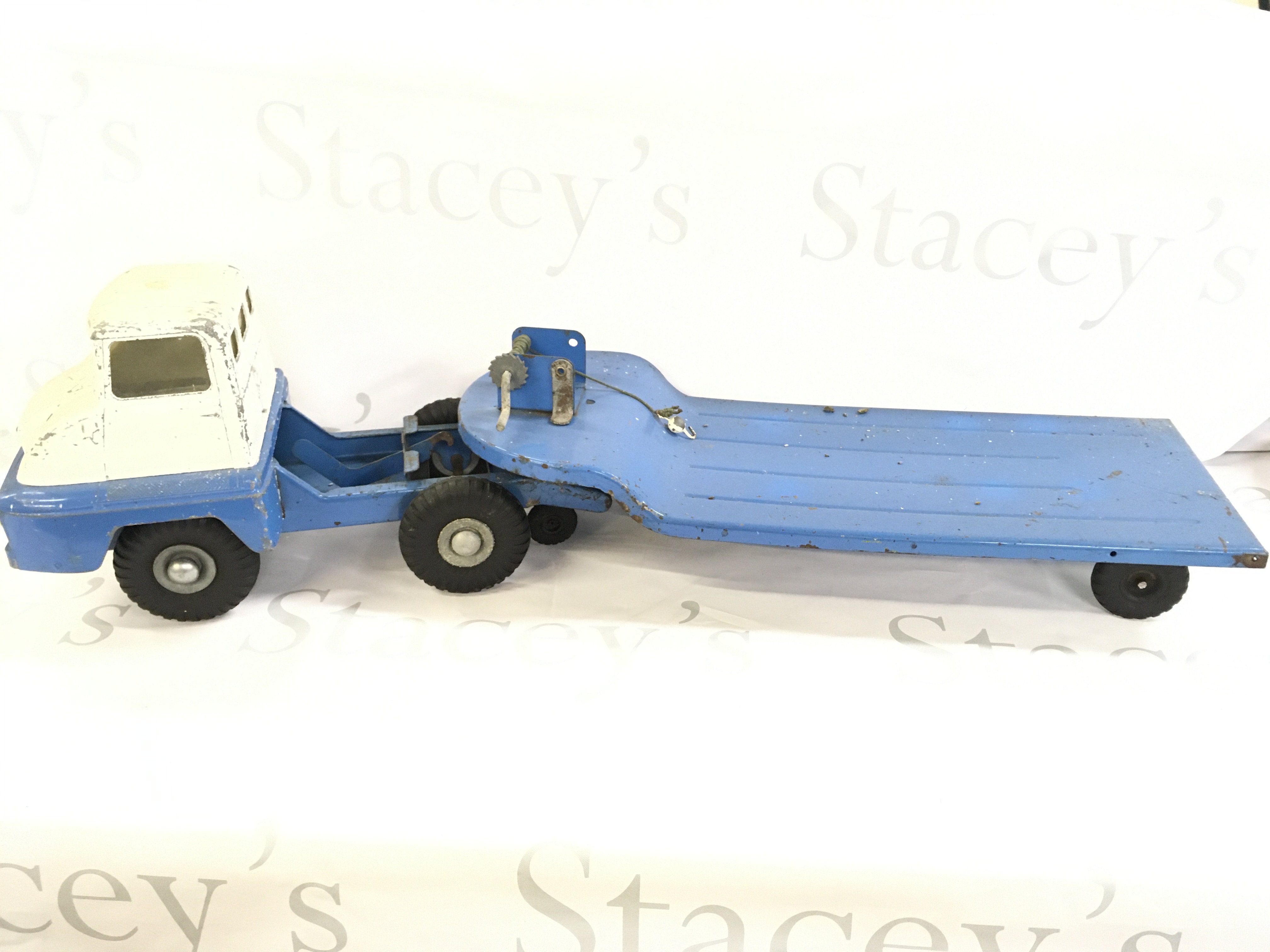 A Tri-Ang Low Loader Truck.