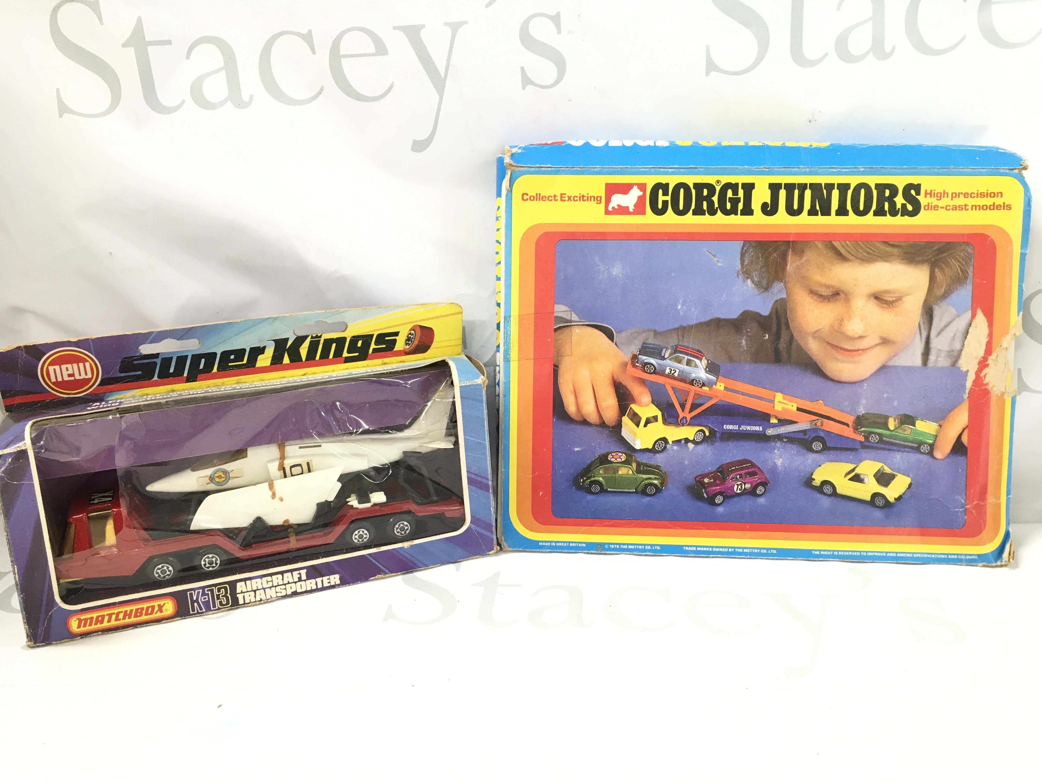 A Boxed Corgi Juniors Transporter Gift Set And A Matchbox Superkings Aircraft Transporter. Boxes Are Worn.
