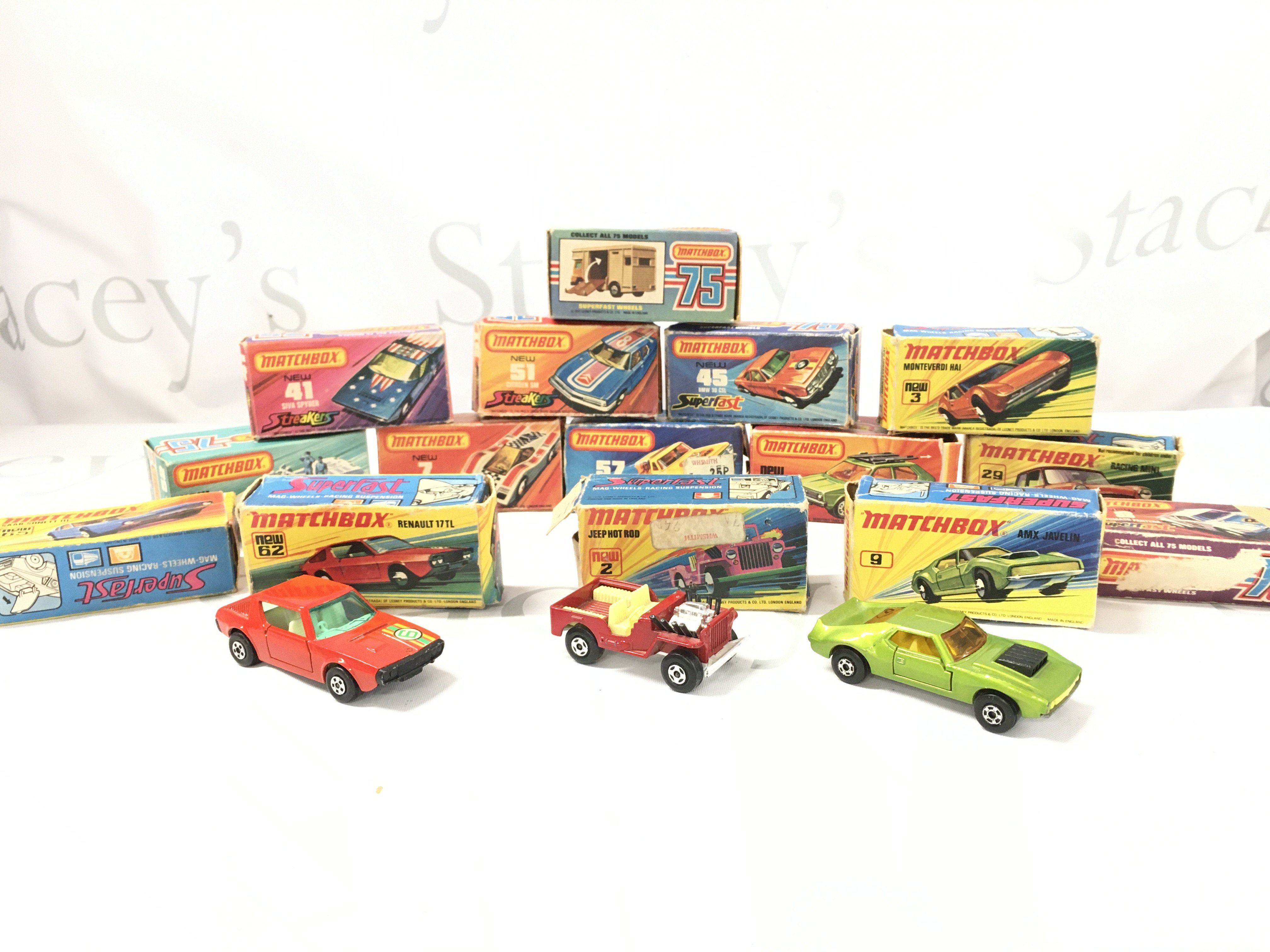 A Collection of Boxed Matcbox Cars. Boxes Are In Various States. Some Cars Have Damage.