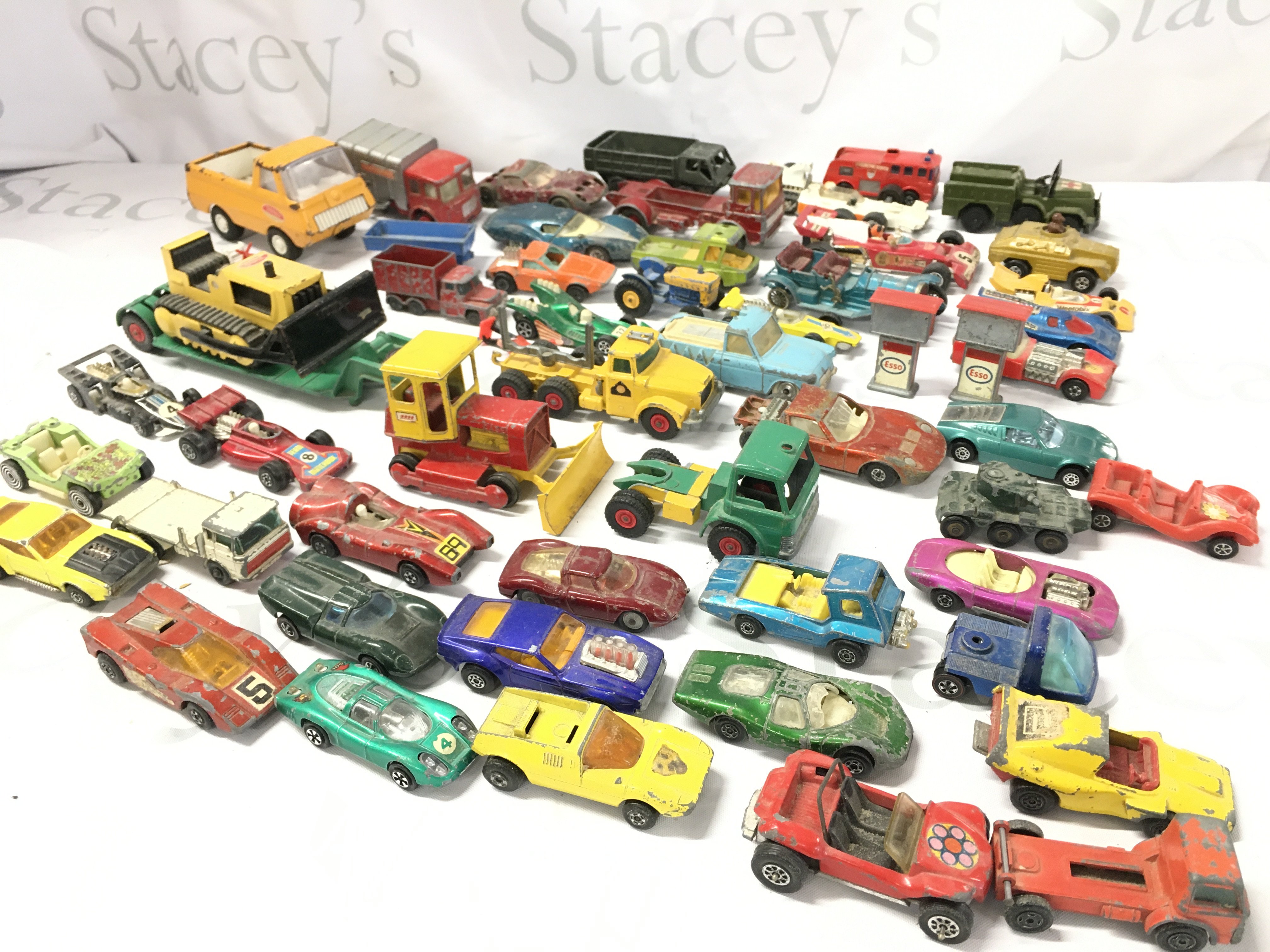 A Box Containing Playworn Diecast Including Matchbox Tonka. Etc.