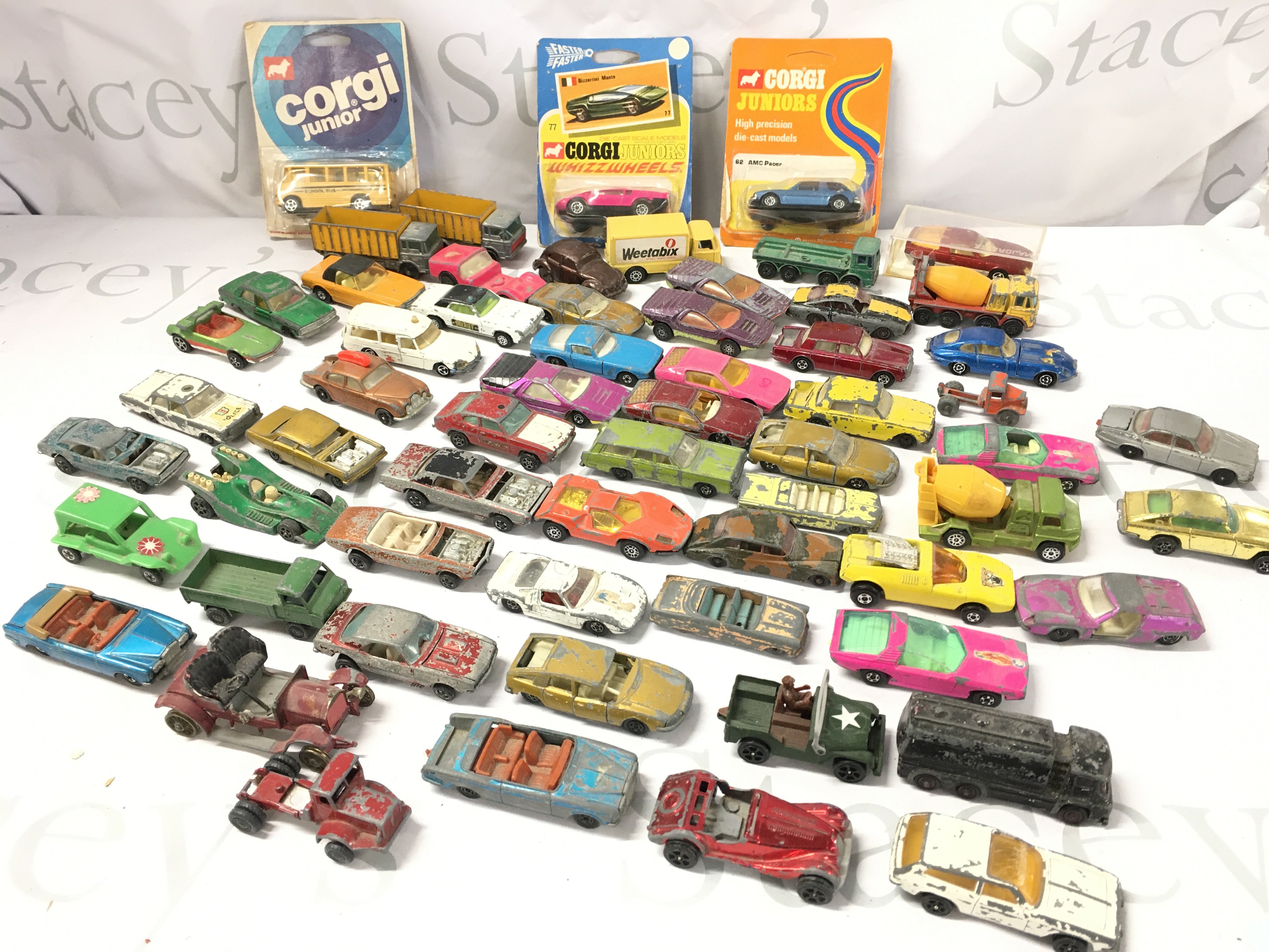 A Collection of Playworn Diecast Including 3 Carded Corgi Cars (Blisters have been opened)