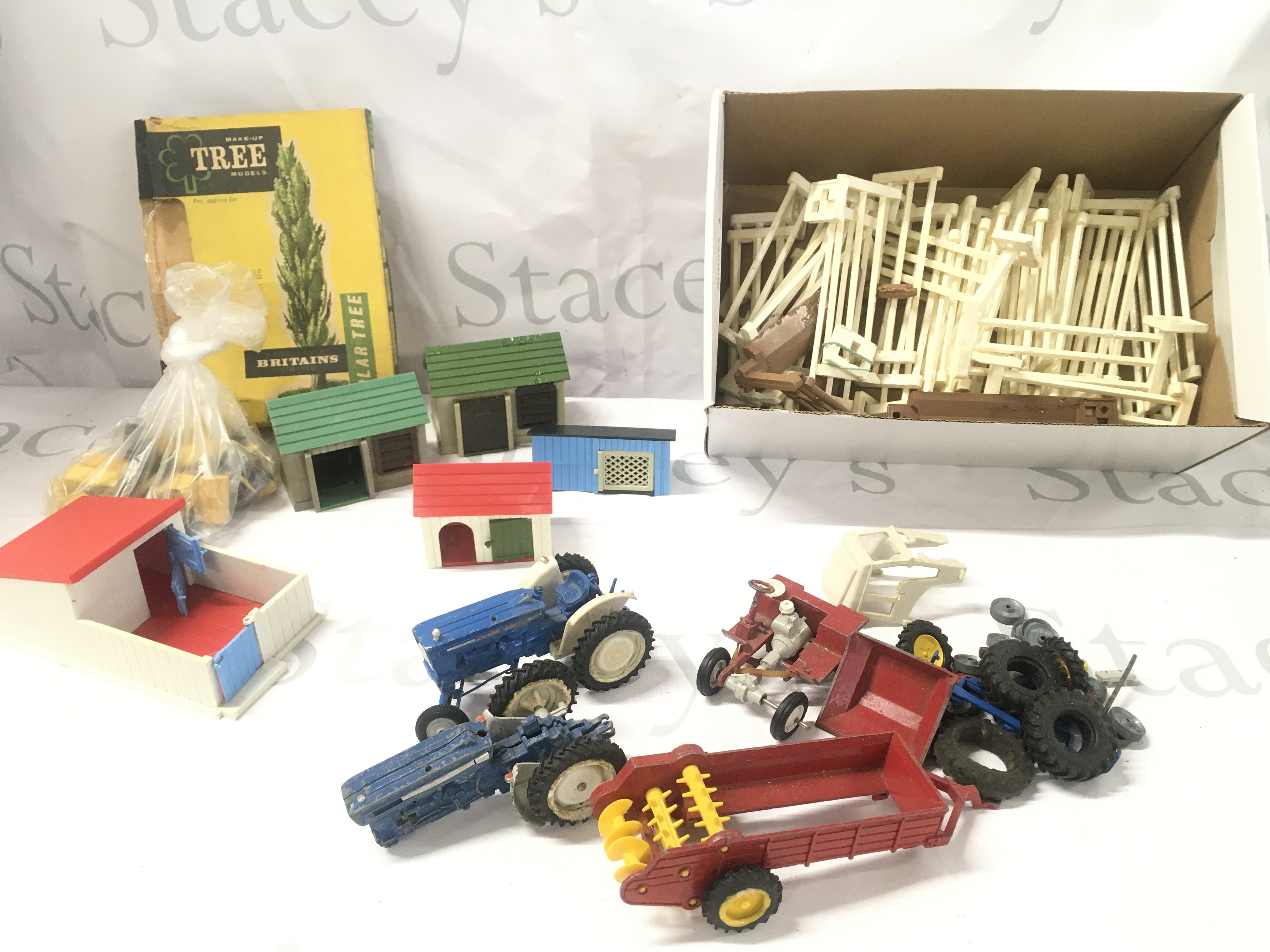 A Collection Of Britains Farm Buildings. Fences. And Equipment. Ideal For Spare Parts Etc. No Reserve.