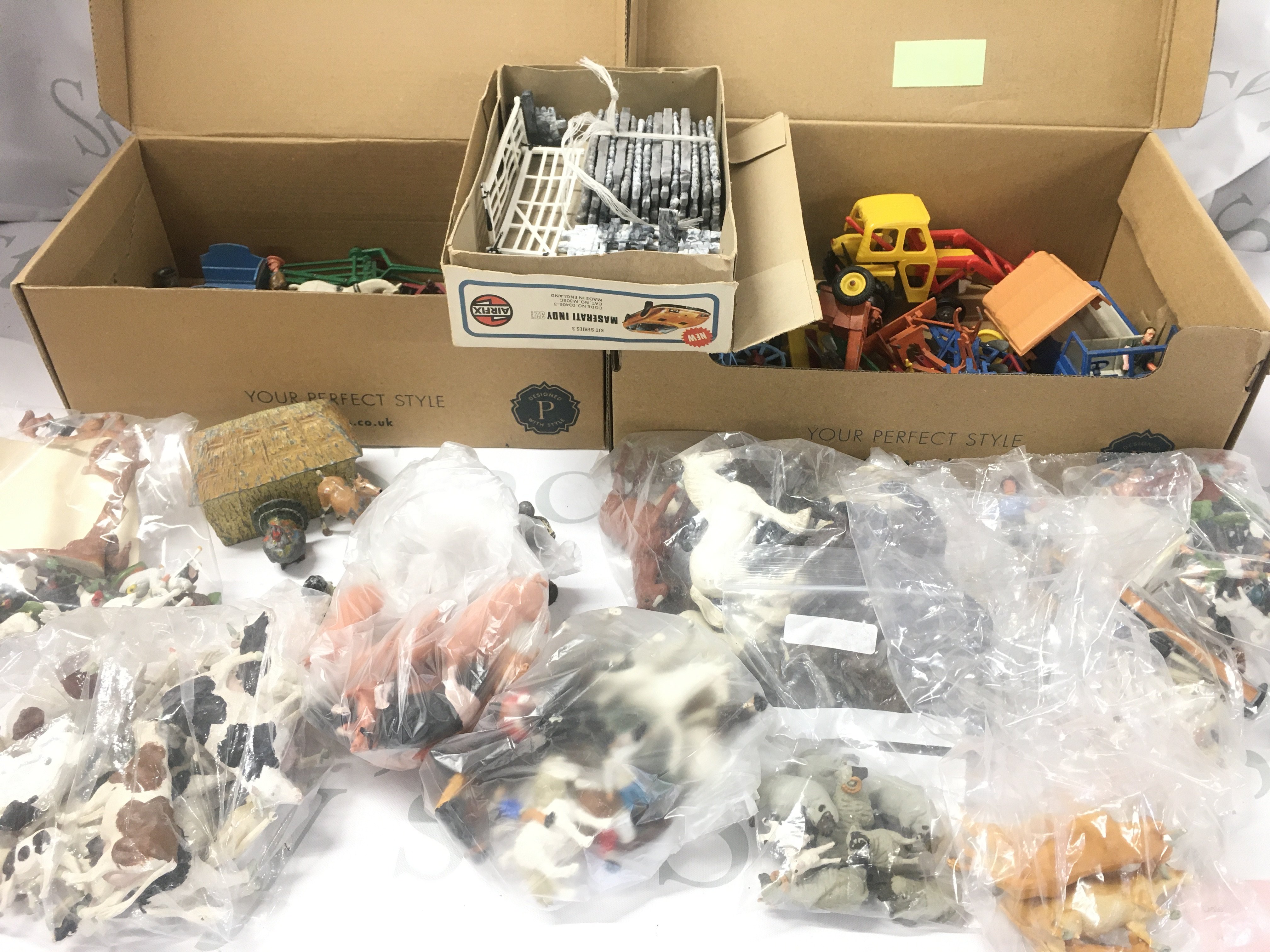 A Collection Of Britains Farming Vehicles. Figures.stone walls. Etc. No Reserve.