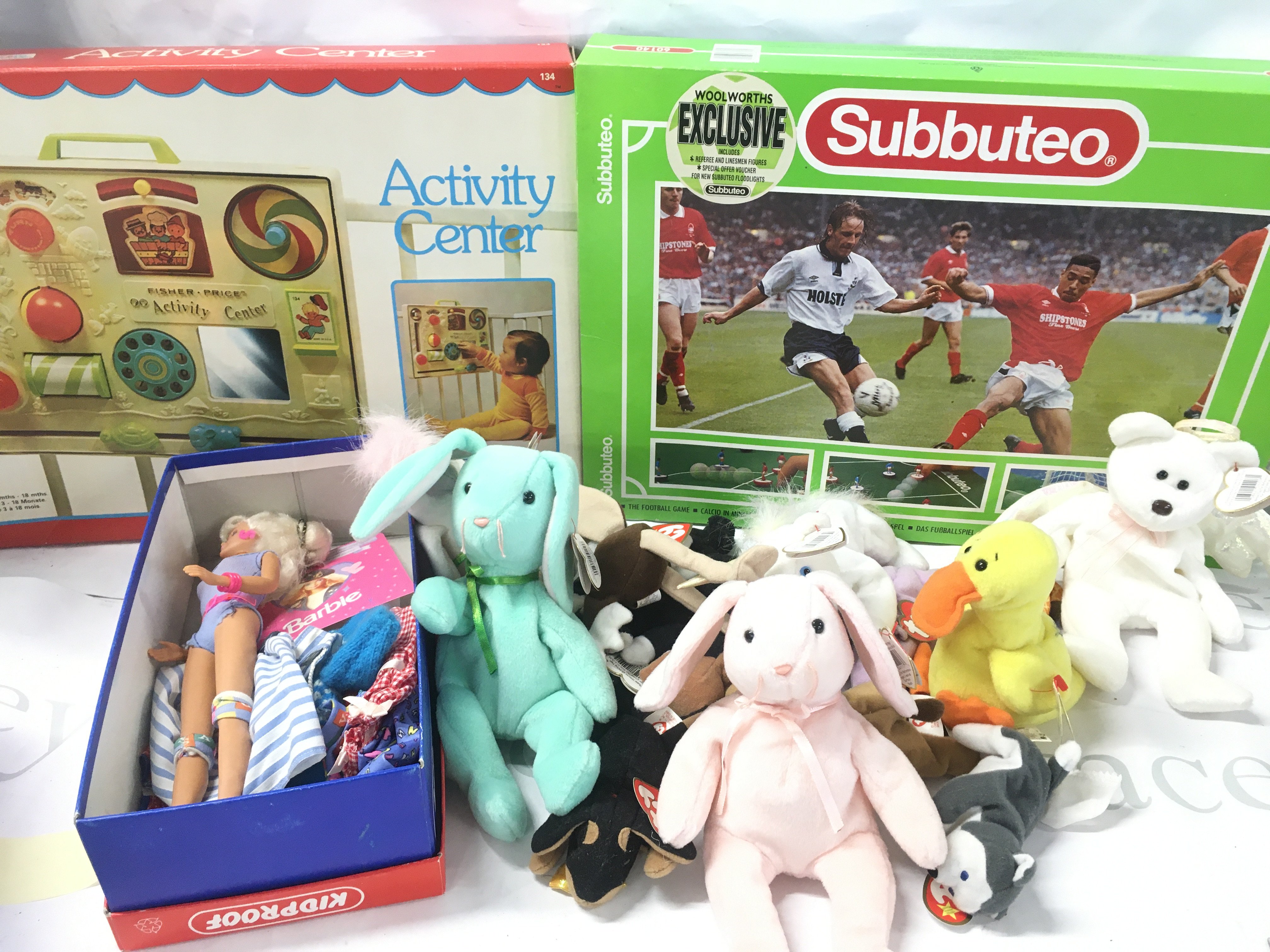 A Collection of Fisher Price Toys. Ty Beenies. Subbuteo And A Barbie.